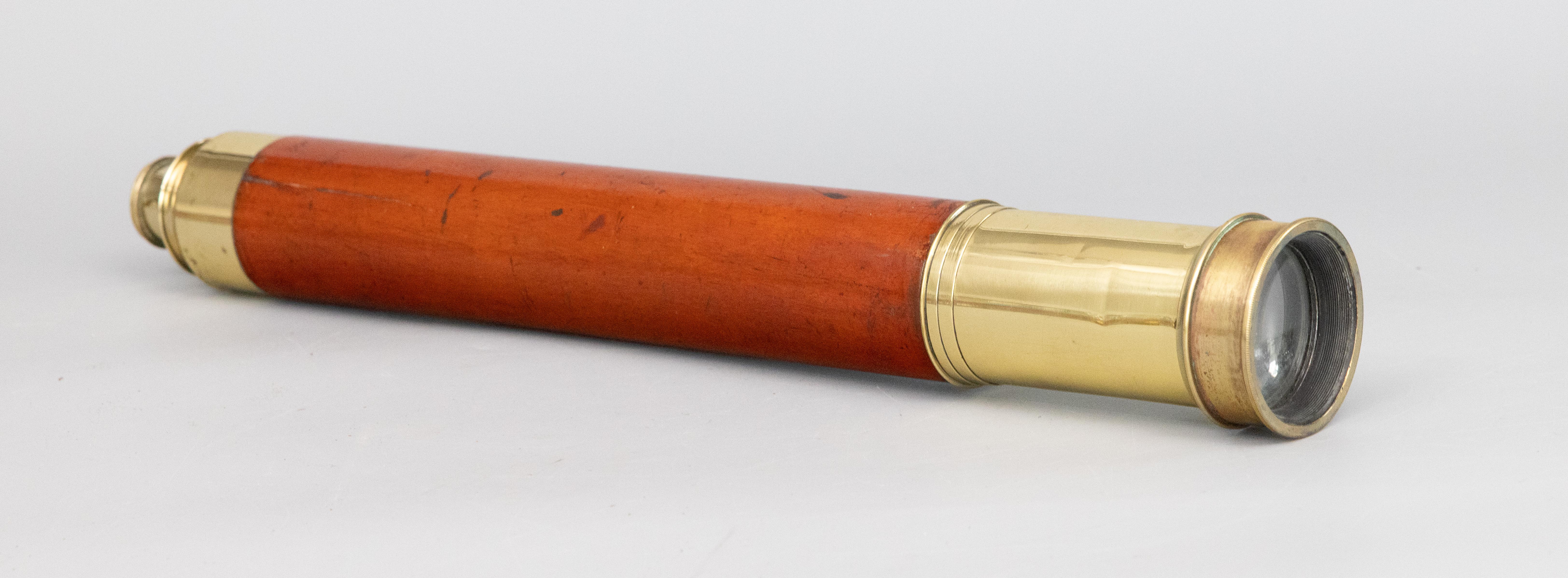 A superb large antique English mahogany and brass nautical maritime telescope or spyglass, London, circa 1850. Inscribed 