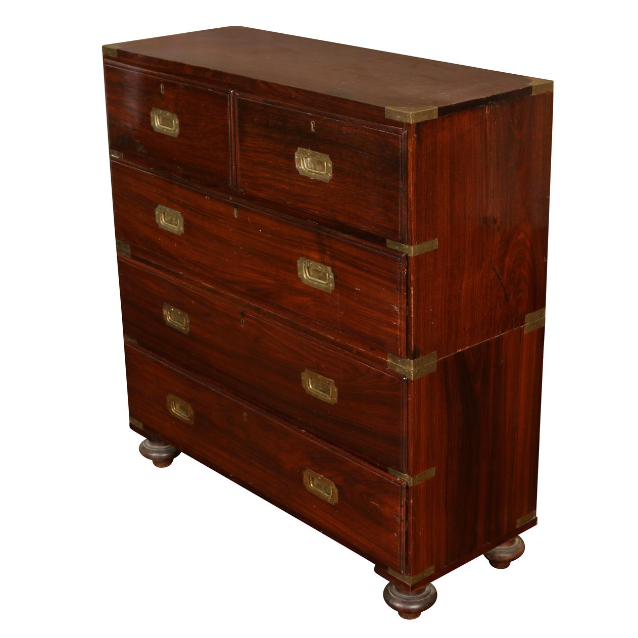 Antique English mahogany five drawer campaign chest with round feet.