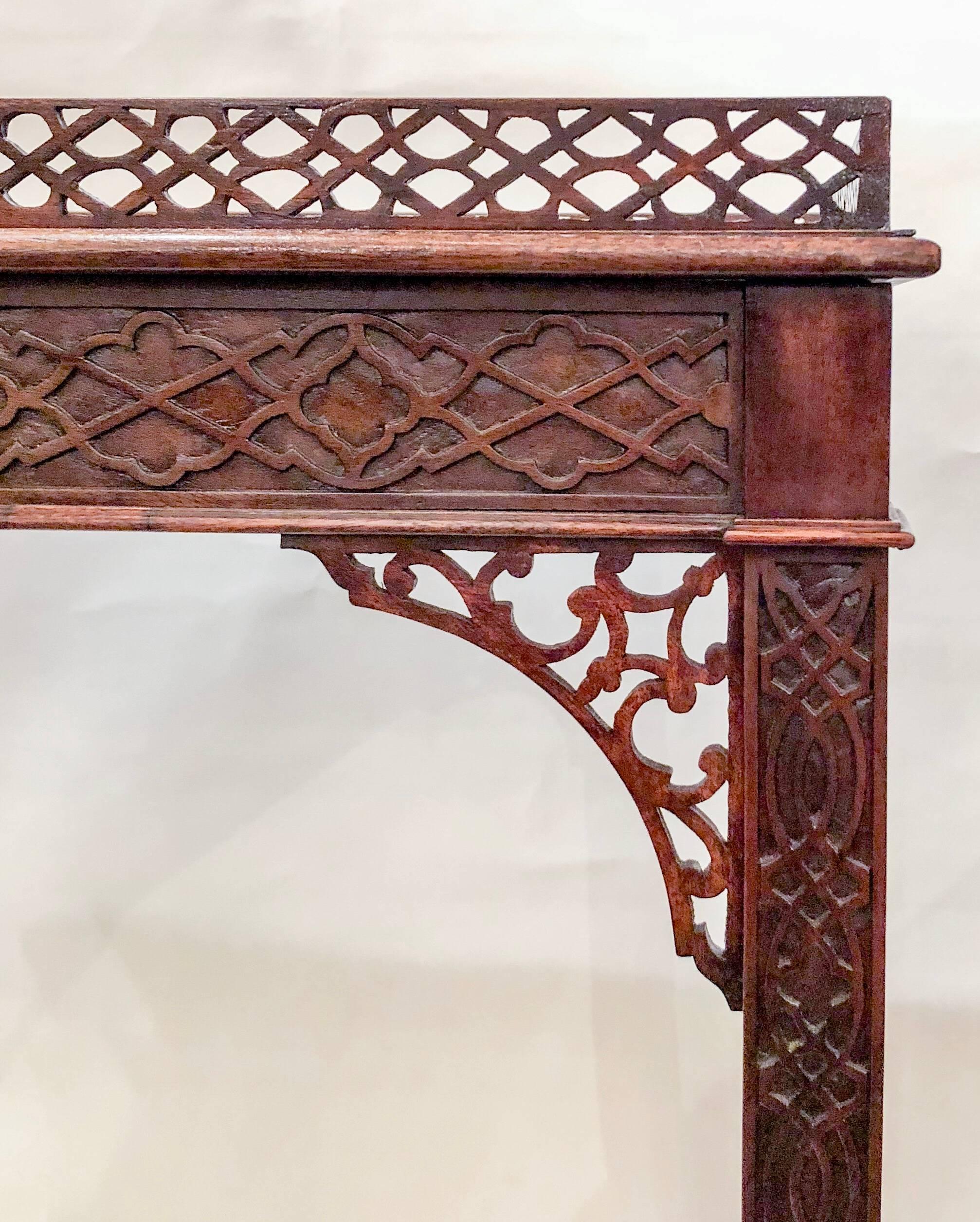 Antique English mahogany Chippendale fretwork tea table, circa 1860-1870.
