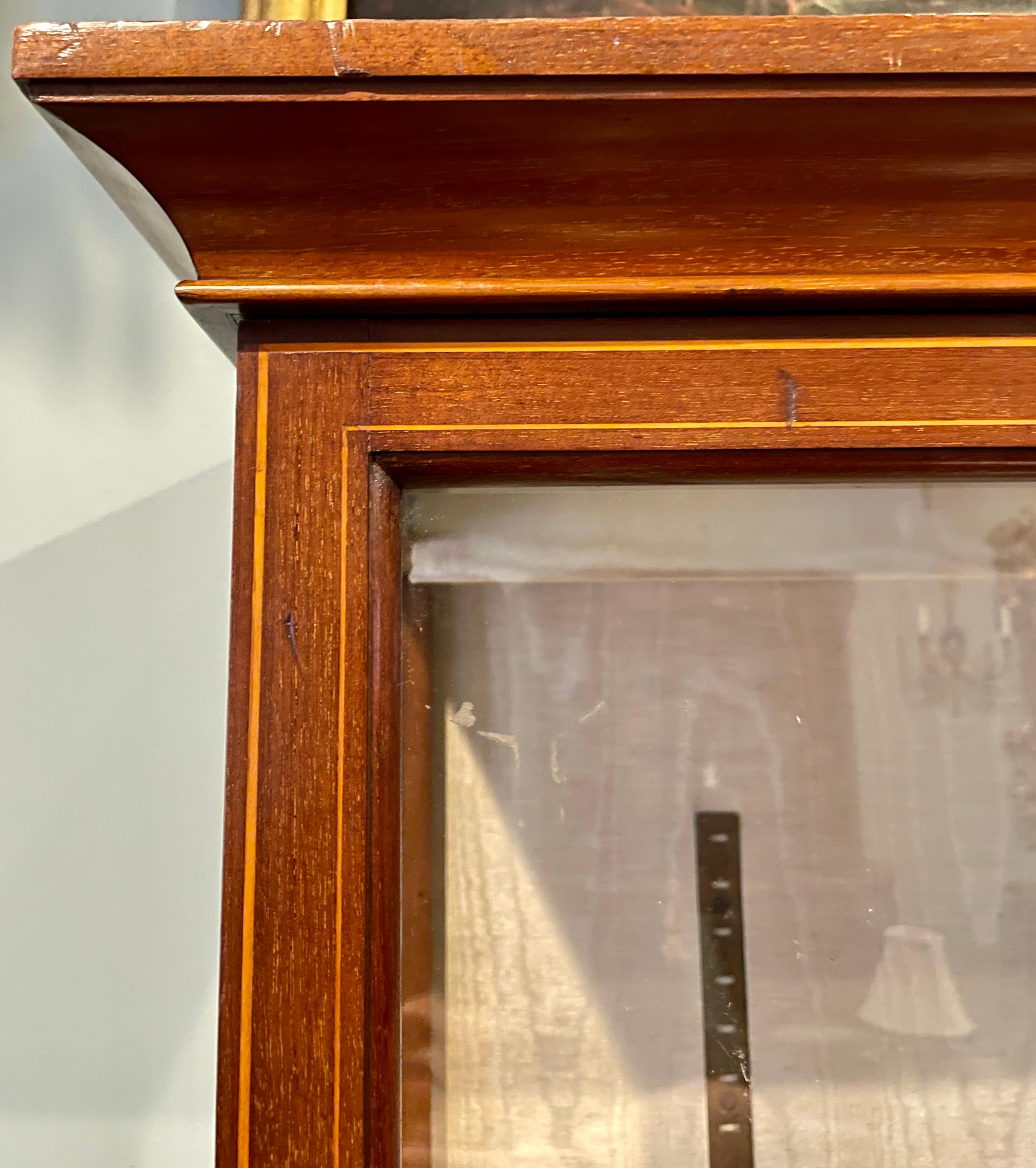 Antique English Mahogany Display Cabinet with Glass Doors and Fitted Shelves, Circa 1890.