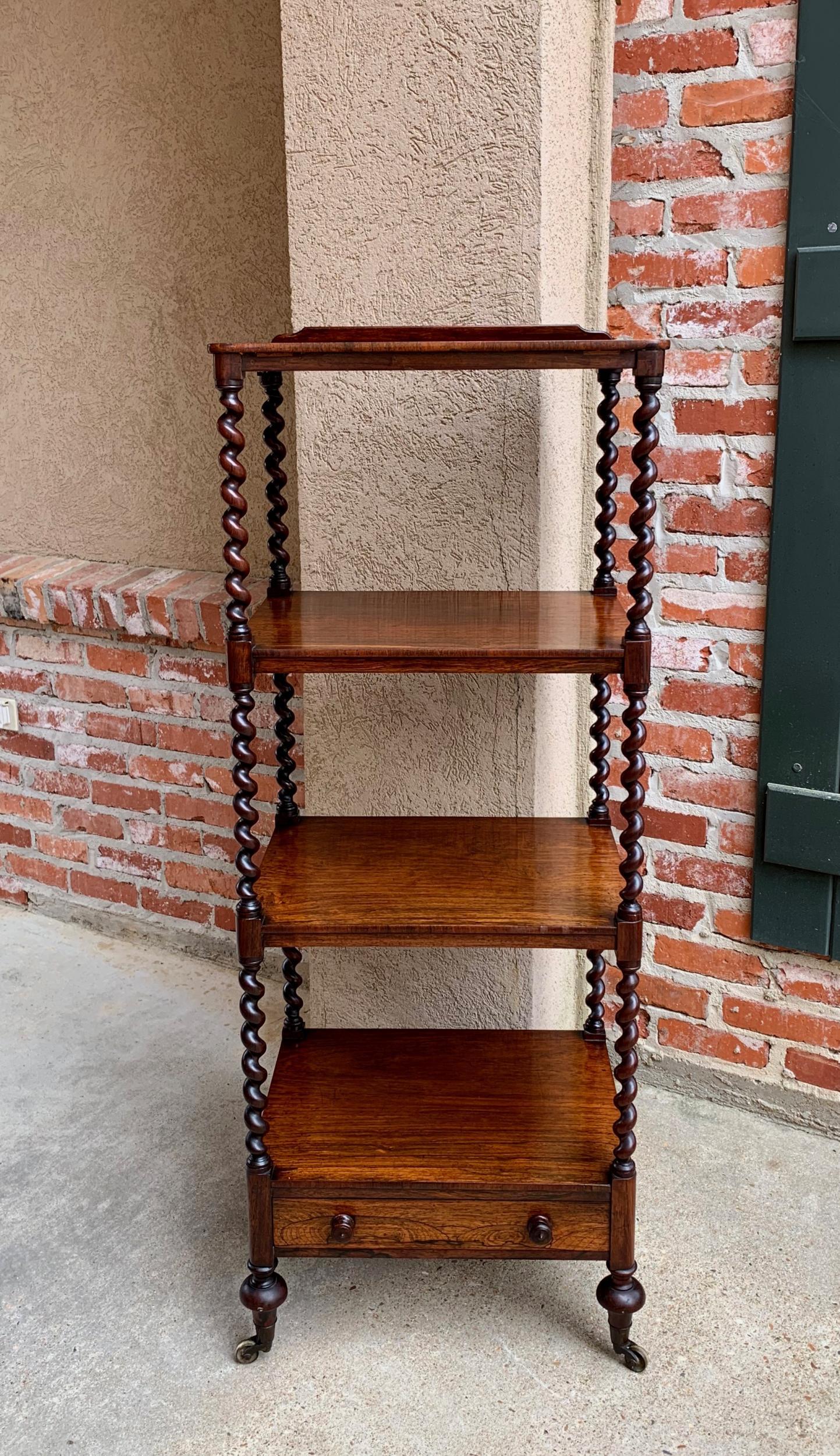 Antique English mahogany display shelf barley twist étagère bookcase, 19th c

~Direct from England~
~Tall antique English étagère, circa 1850~
~Barley twist columns on all four sides, with beautiful English burl mahogany veneer~
~Four shelves