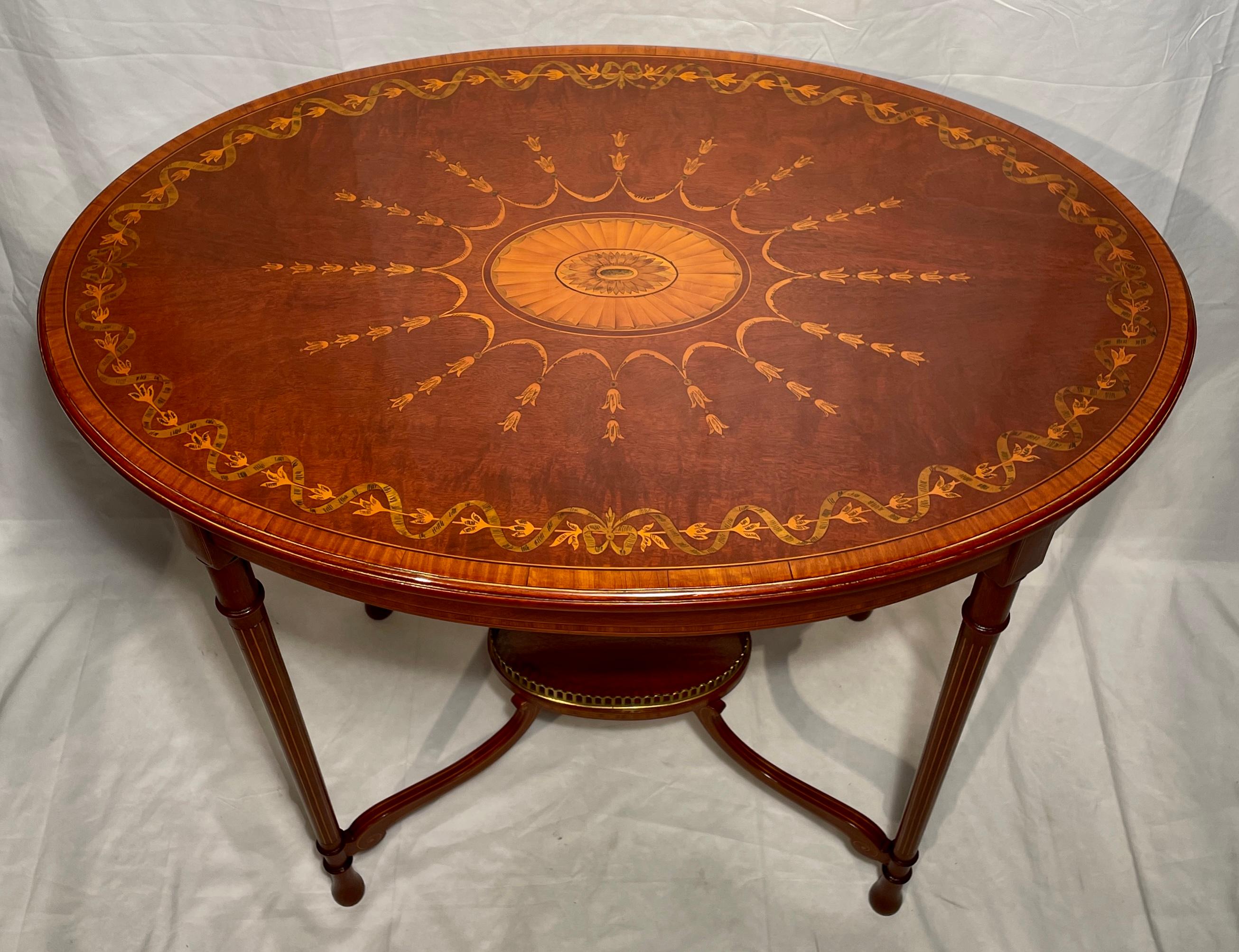 Antique Late 19th Century English Mahogany Oval Table with Inlay.
We currently have 2 of these and they can be sold individually or as a pair.