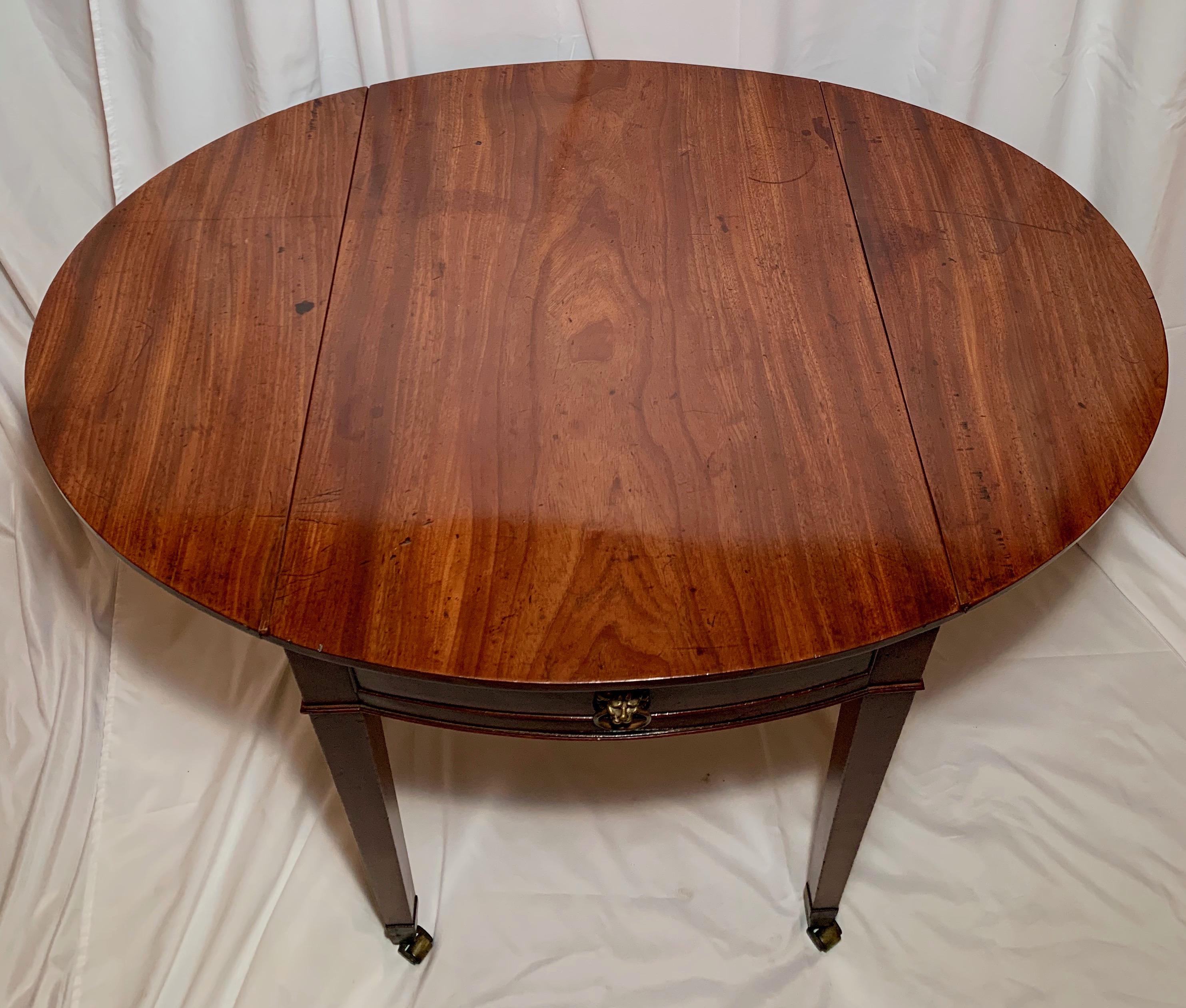 Antique English mahogany Pembroke table, circa 1880.

 