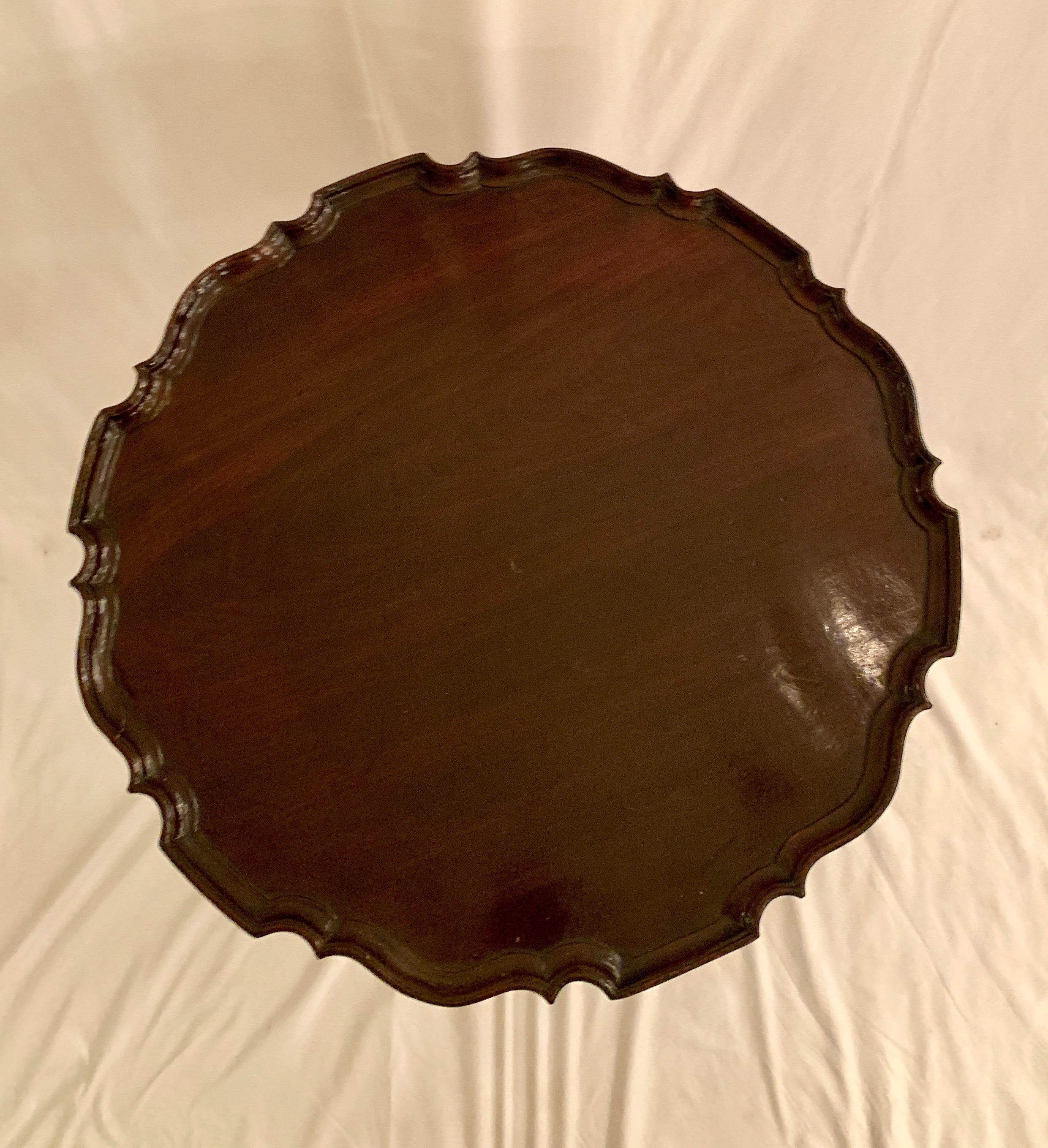 Antique English mahogany pie crust table, late 19th century.