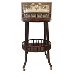 Antique English Mahogany Revolving Hidden Bar by "Halstaff and Co.", Circa 1920.