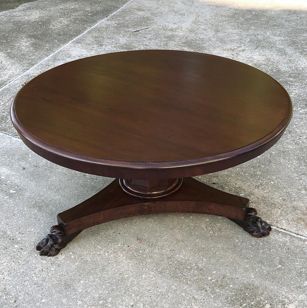Antique French 19th Century Louis Philippe Mahogany Round Coffee Table features tailored yet elegant lines ~ perfect for a bit more formal rooms, yet so clean of form that it works for modern casual decor as well.  Tripod footed base, faceted