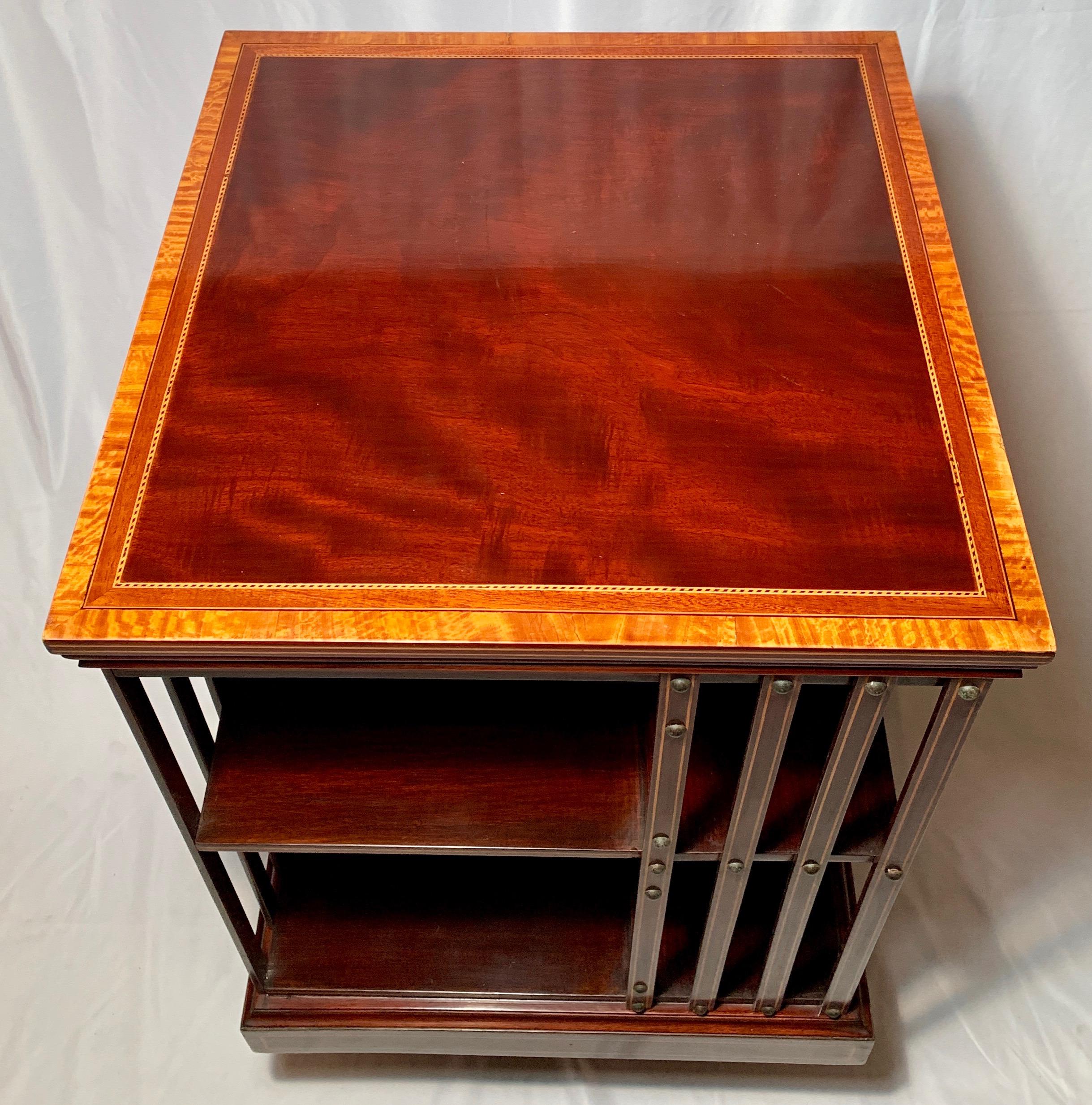 Antique English mahogany satinwood inlaid revolving bookstand.

 