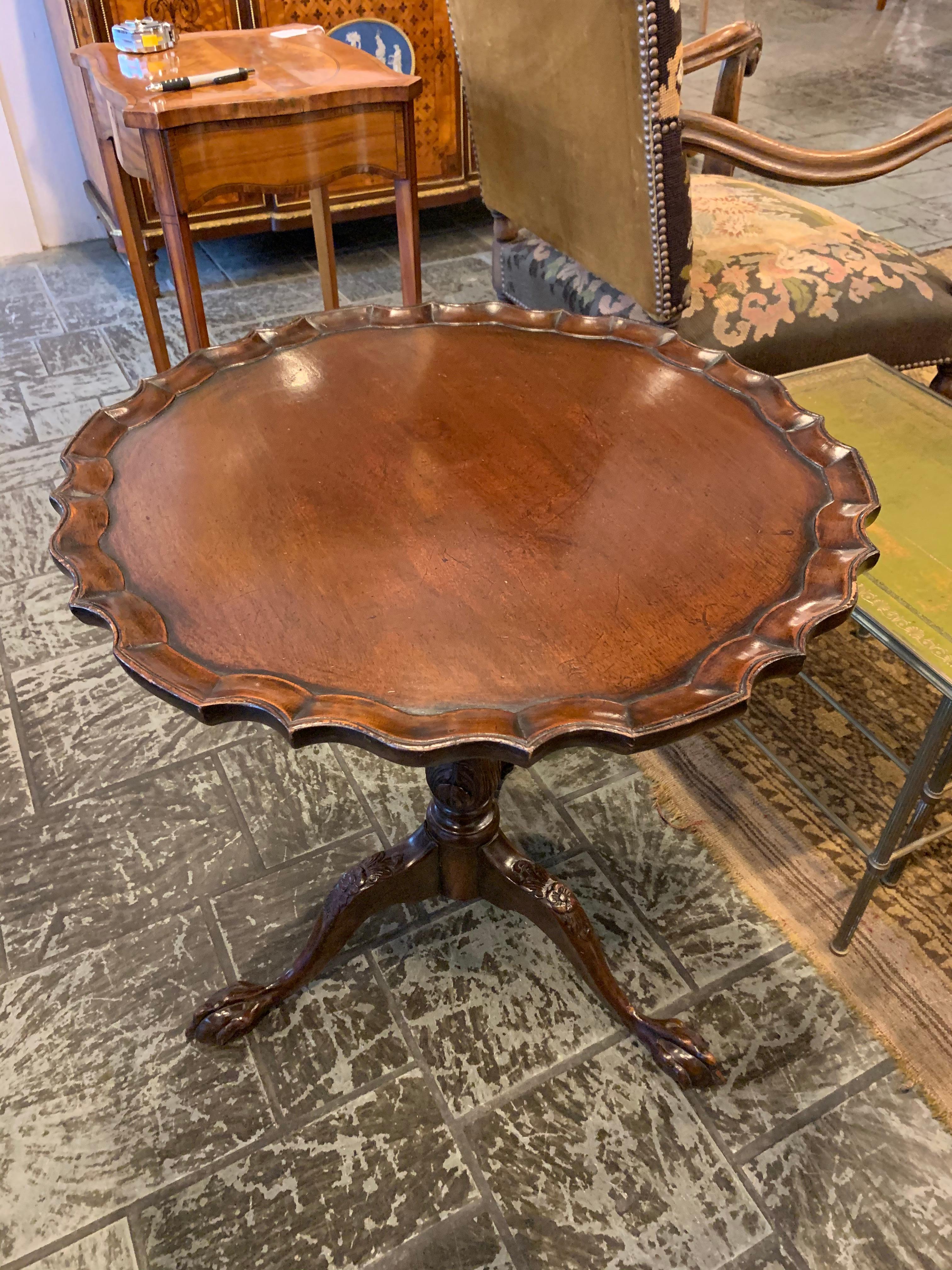 Antique English mahogany small pie crust table.