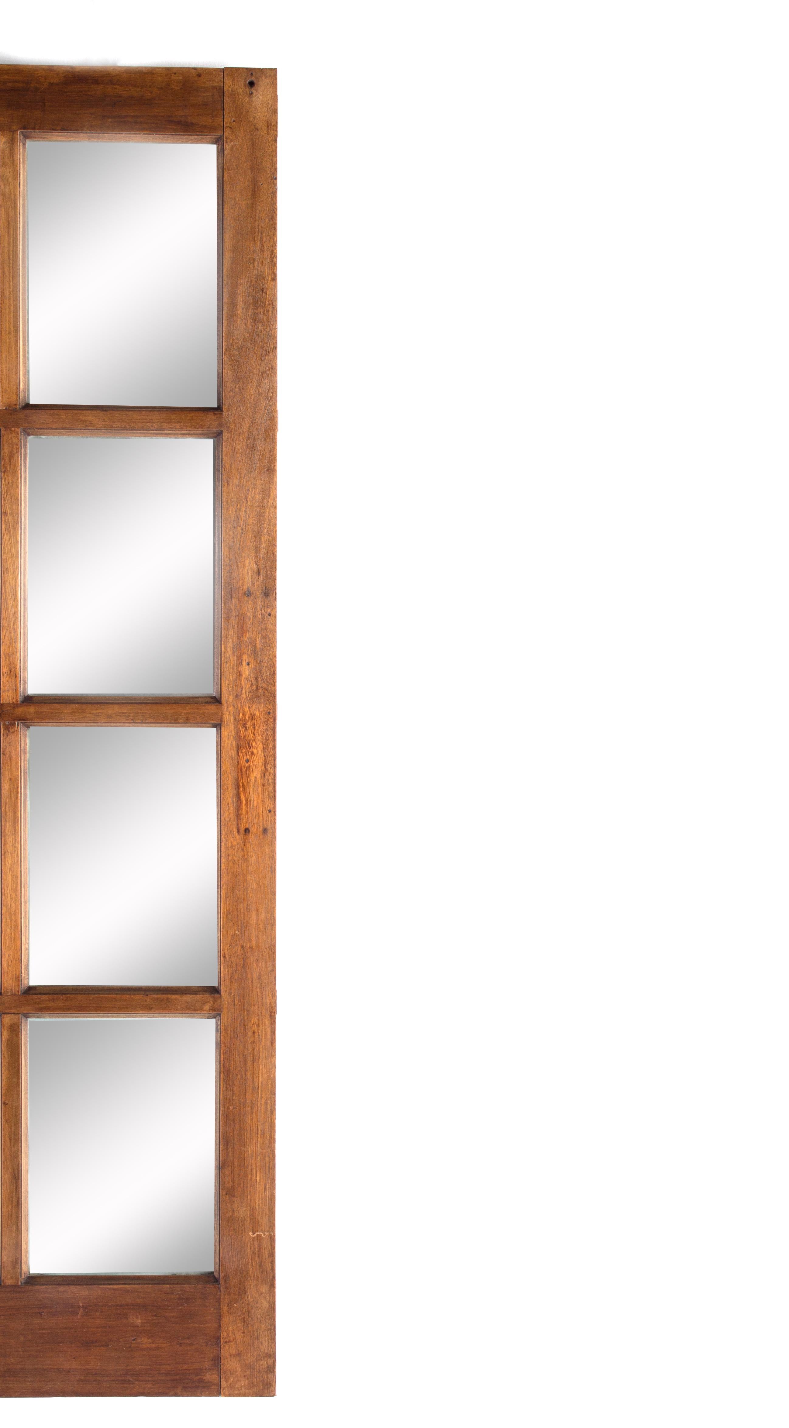 This antique English mahogany wood window frame with a thick outer edge is the perfect addition to any room. It can be used as a mirror or artwork, with a modern and vintage feel to achieve something special in your space! These frames look great on