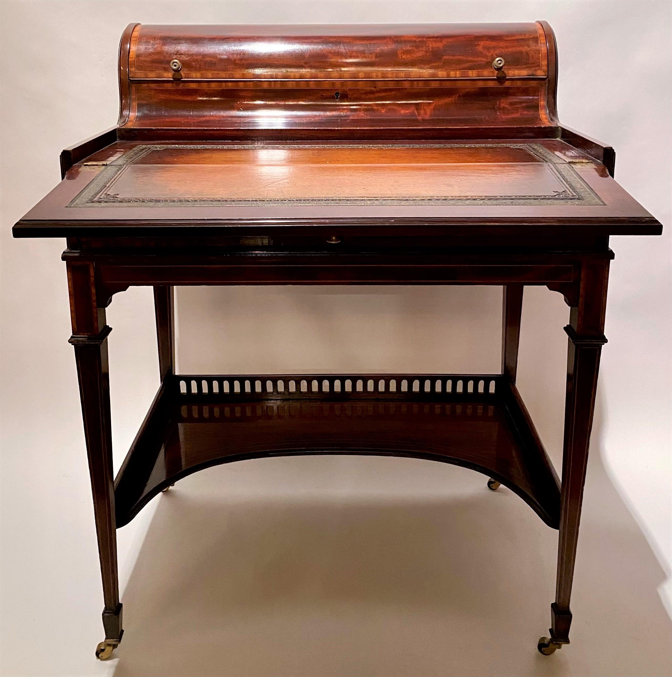 Antique English mahogany writing desk on casters, exceptional quality and design, Circa 1875-1895.