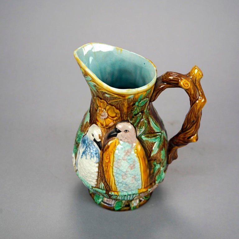 Antique English Majolica Pottery Pitcher with Birds and Twig Handle