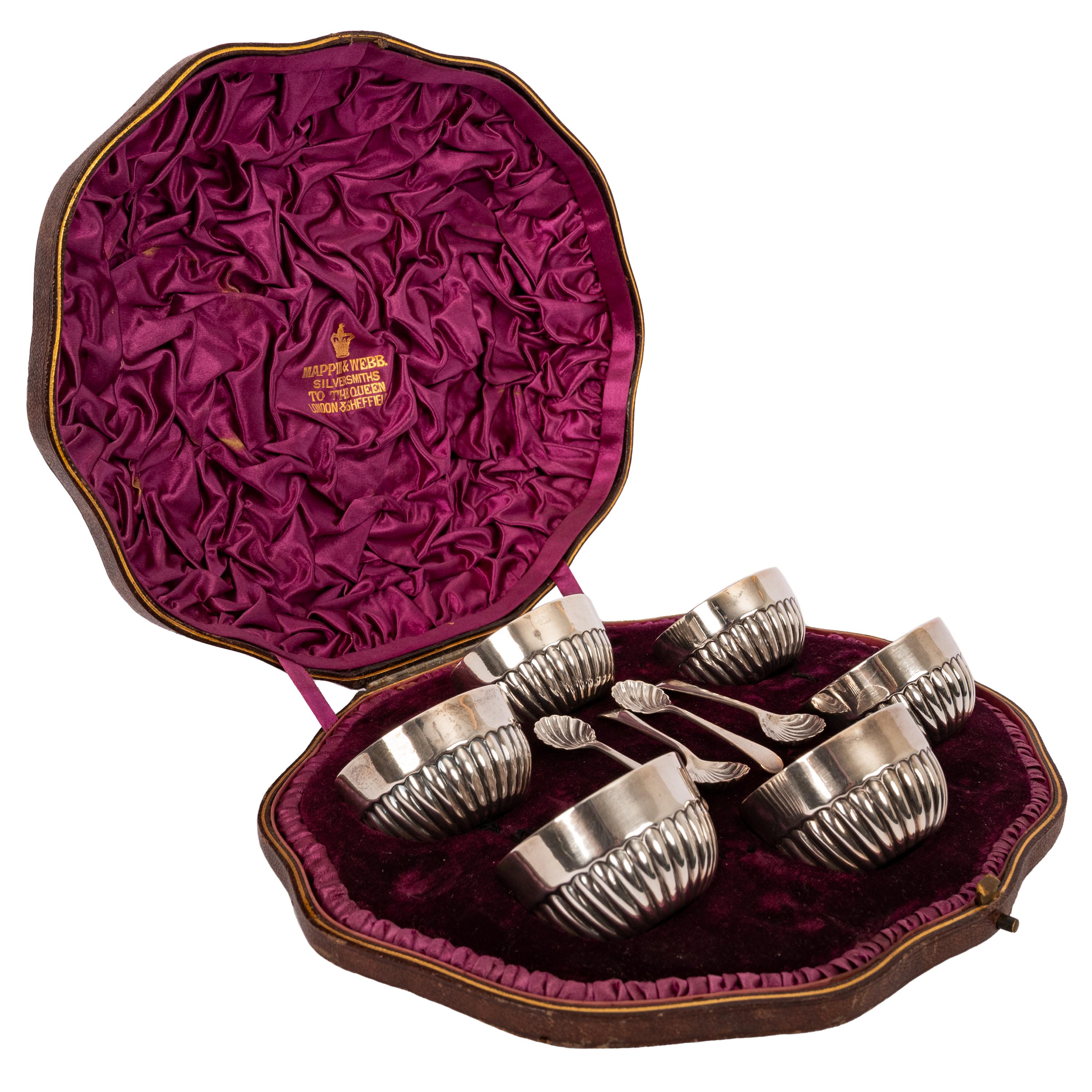 A good antique set of sterling silver salts and spoons, Mappin & Webb, Sheffield 1886.
Housed in the original hard leather case, containing six circular ribbed salts and four matching spoons. Each salt is stamped with the date letter for 1886 and