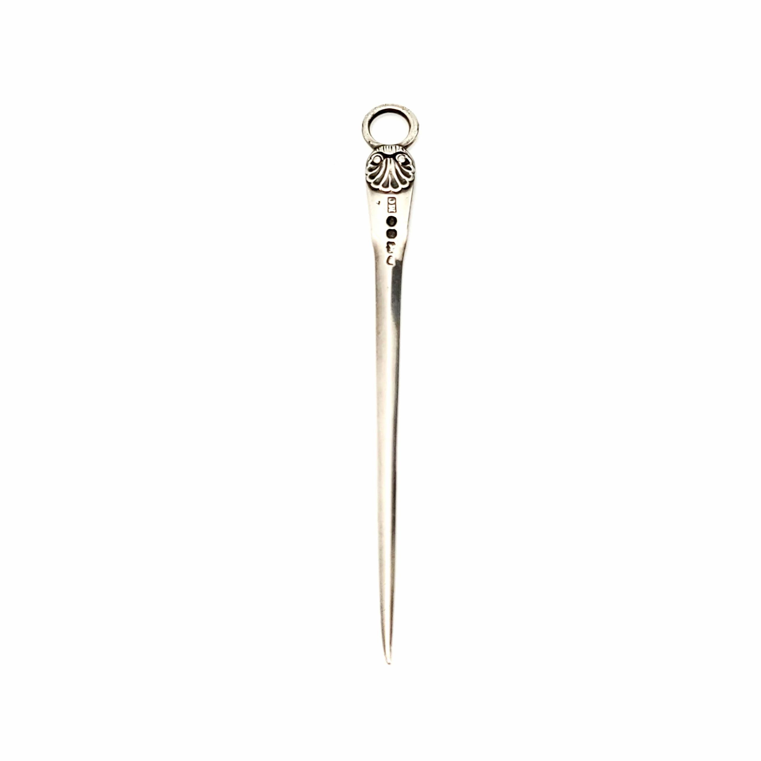 Antique English sterling silver letter opener or skewer by Mary Chawner, circa 1836.

No monogram.

Mary Chawner was a noted silversmith and spoonmaker from 1834-1840. This letter opener is adorned with a scallop design and an etched