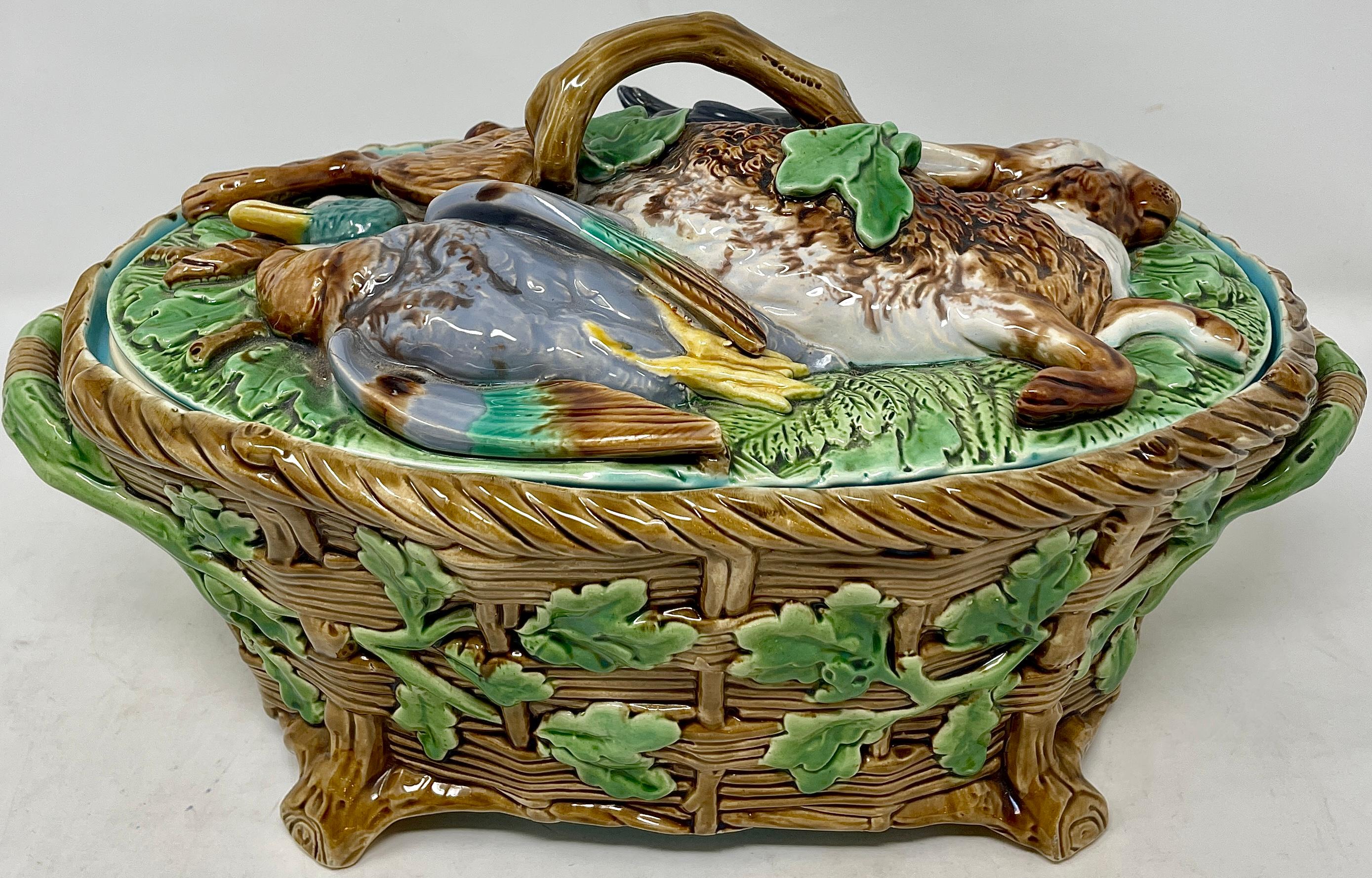 Antique English Minton Majolica porcelain figural Duck & Rabbit Tureen, circa 1890's. Pretty basket and ivy design with hand-painted colors of lavender, plum, teal, green & brown.