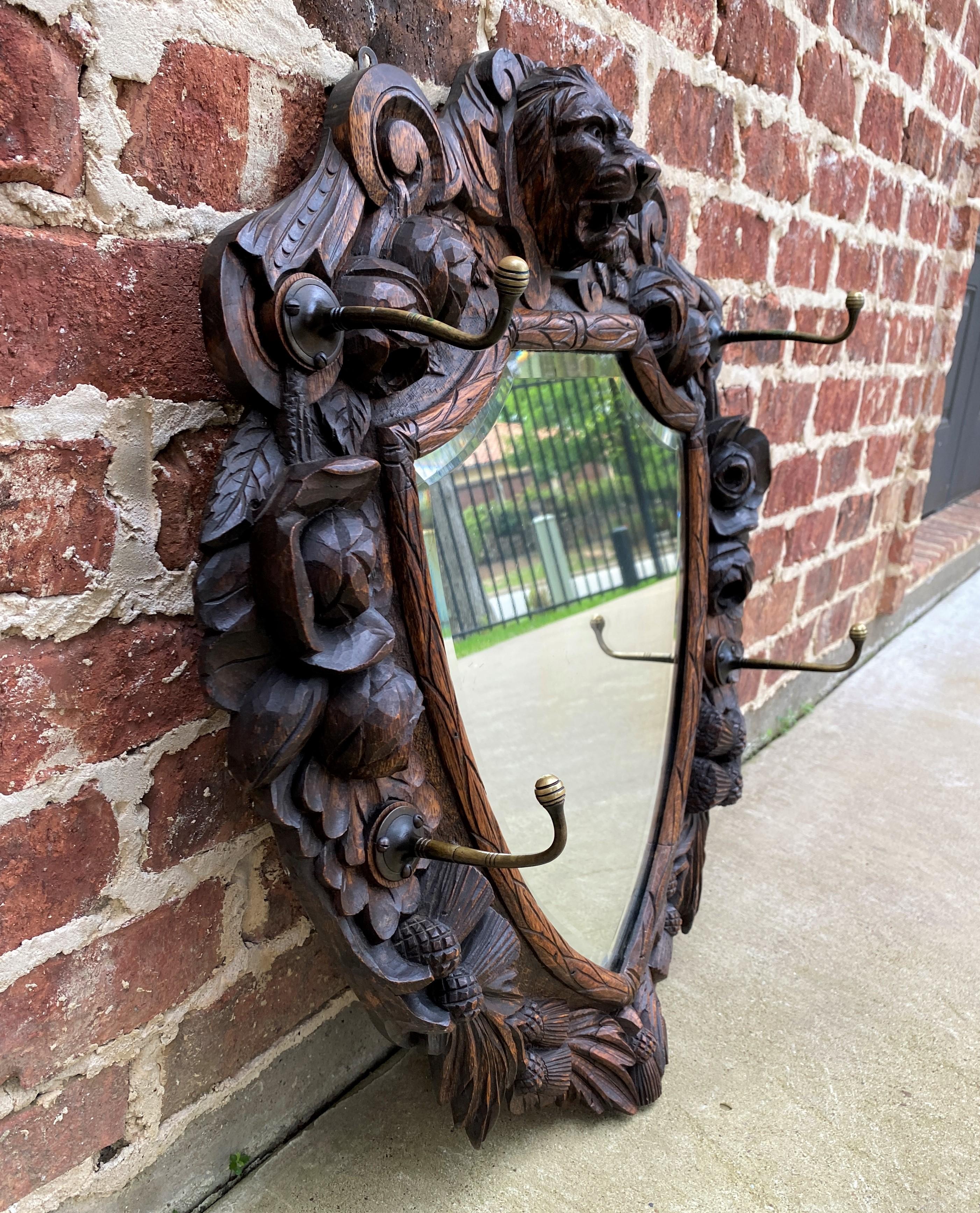 Antique English Mirror Renaissance Revival Oak Frame Shield Shape Lion Wood Back 1