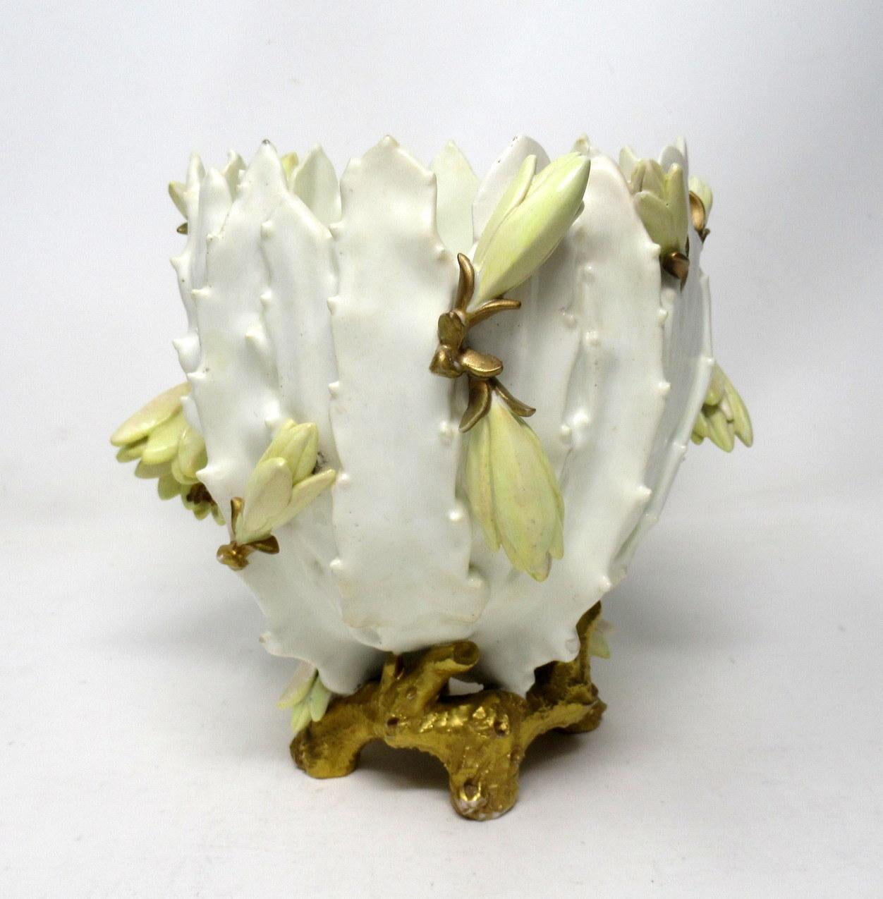 A very impressive example of an English Moore Brothers Porcelain centerpiece of outstanding quality and medium proportions. 

Last quarter of the 19th century. 

This rare and unusual bulbous form centerpiece depicting flowering Cacti, on a leaf