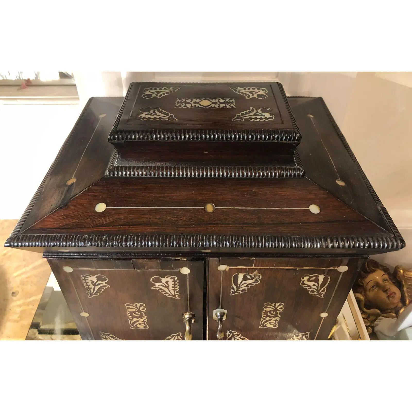 Antique Japanese Mother of Pearl inlaid jewelry box w lap desk

This item includes restricted materials and can not be sold outside of the contiguous United States.

Additional information: 
Materials: Mother-of-Pearl, Rosewood
Please note