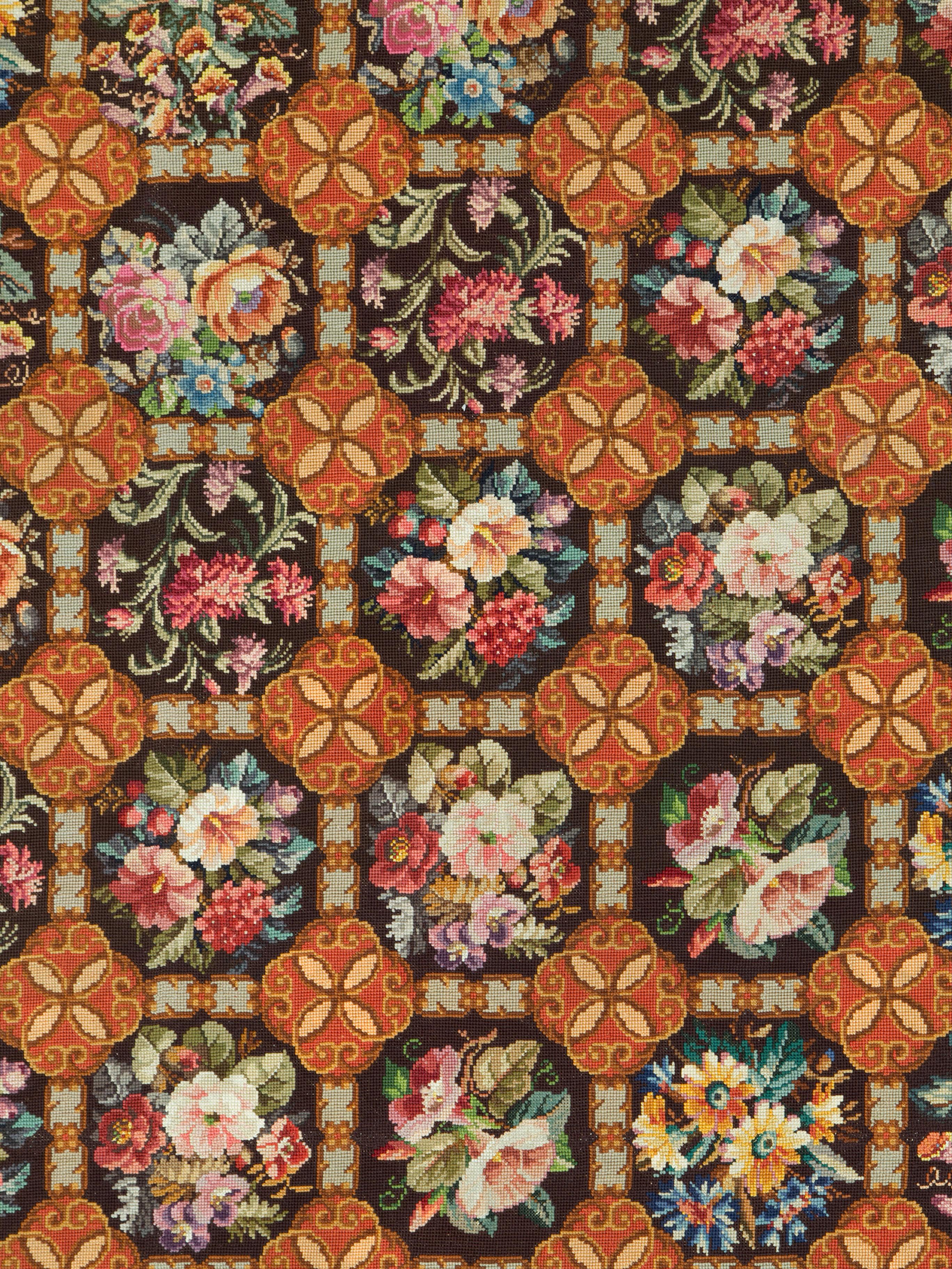 Ein antiker englischer Nadelteppich aus dem frühen 20. Jahrhundert.

Maße: 9' 3