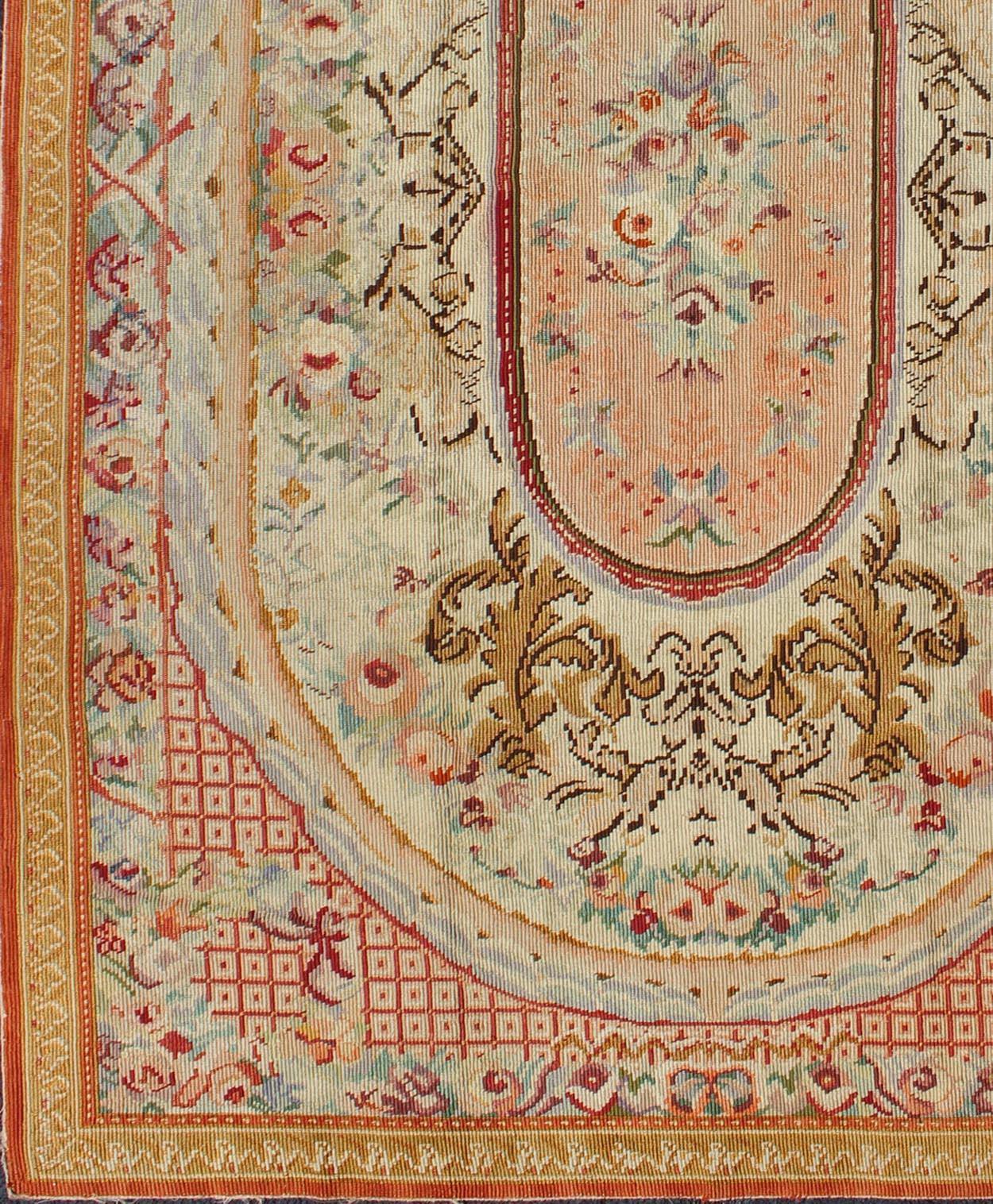 Antique English Needlepoint with Floral Design and Central Floral Medallion. Rug/I-0201, French Aubusson, Needlepoint Aubusson. 

This colorful antique English needlepoint Aubusson features multi layered floral medallion design which displays