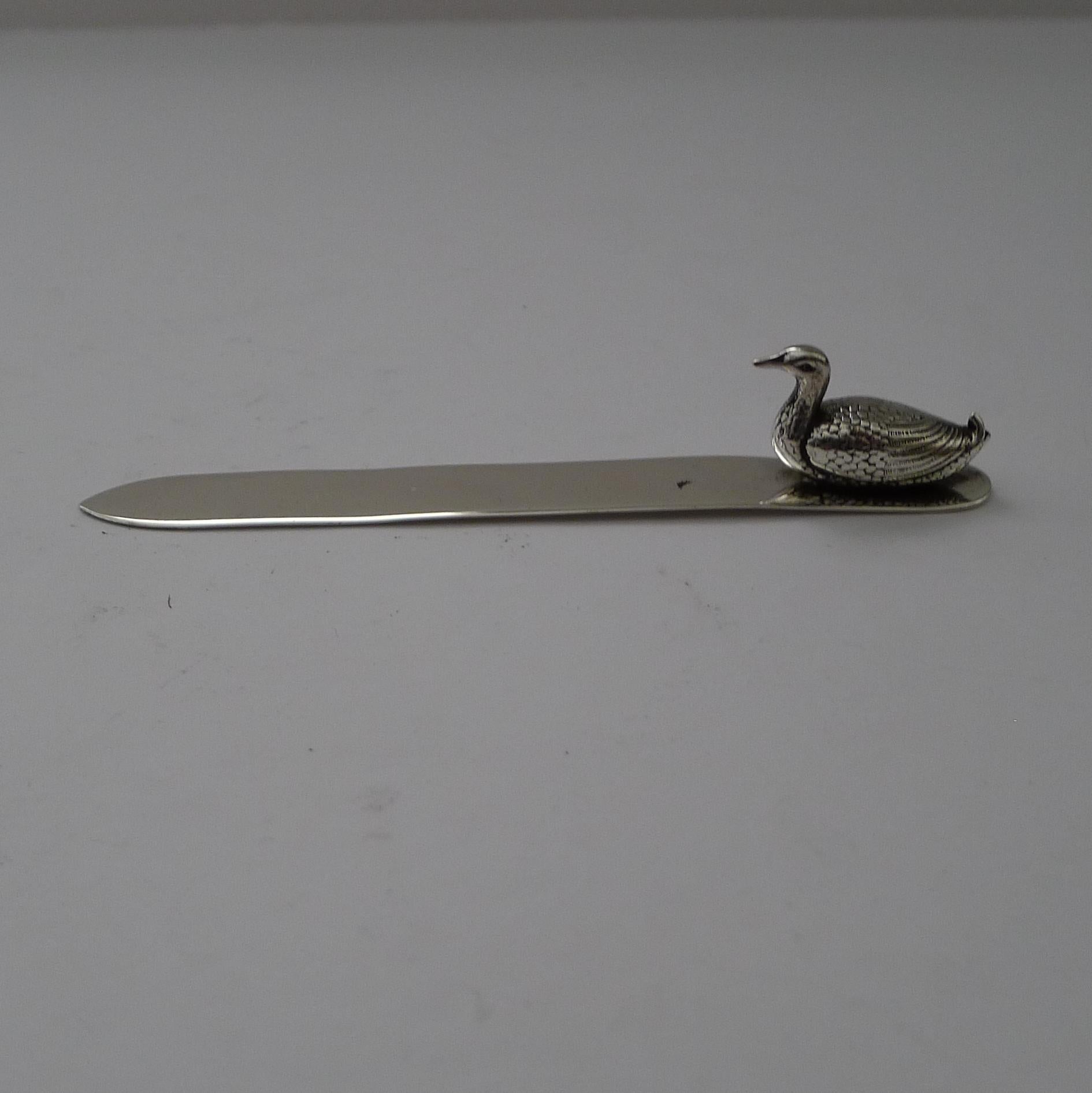A rare and highly collectable letter opener made from solid English sterling silver with the handle mounted with a charming Duck figure. 

The underside is fully hallmarked London 1922 together with the markers mark for Sampson Mordan &