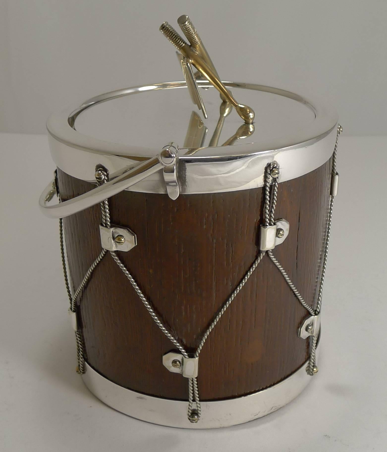 A wonderful Victorian biscuit box or barrel, always highly sought-after in this Drum form, I have probably not had one for three or four years, that's how scarce and hard to come by they are.

The fittings are made from silver plate with the lid
