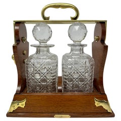 Antique English Oak and Brass 2 Bottle Tantalus, Circa 1880.