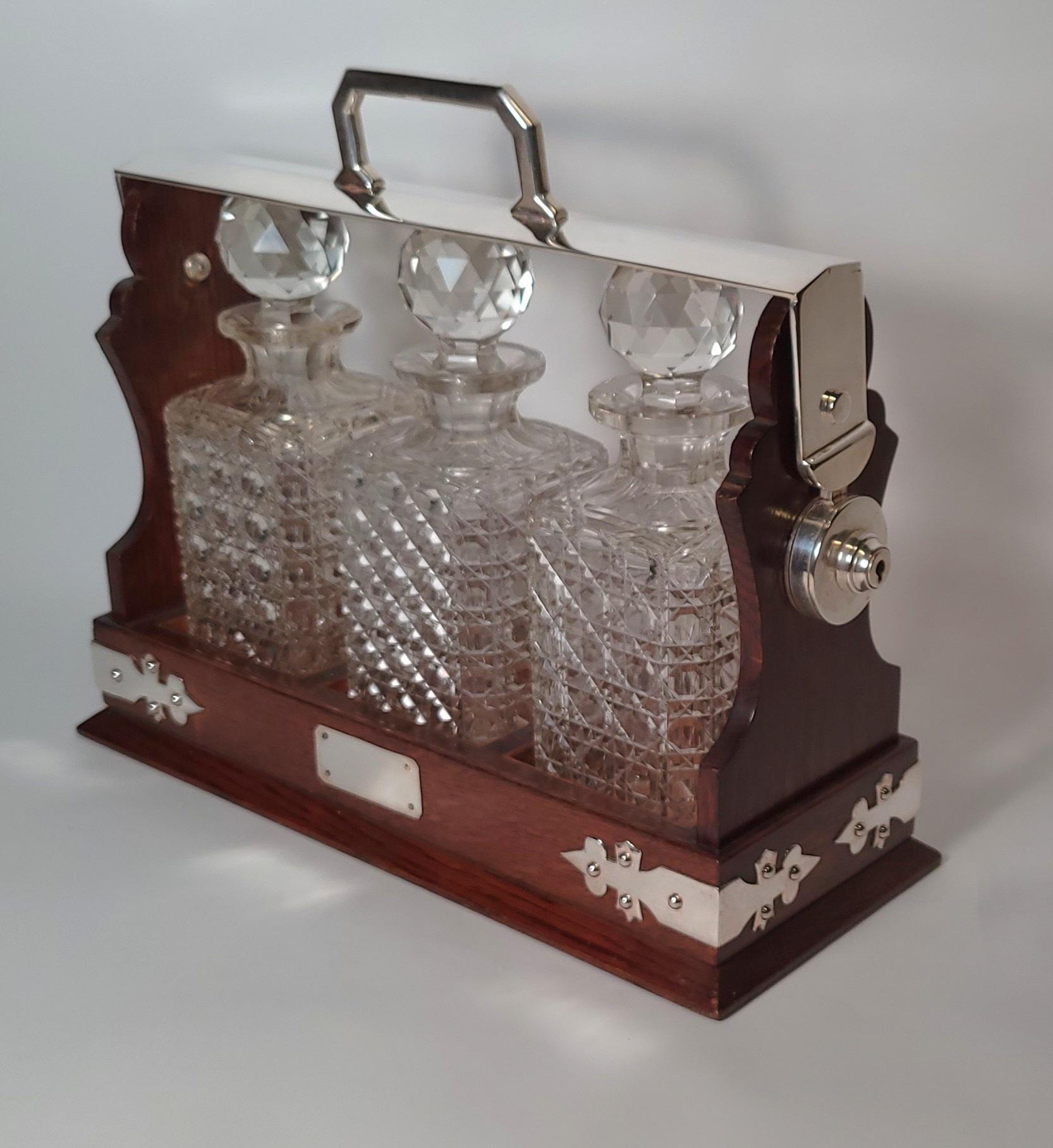 antique tantalus decanter set