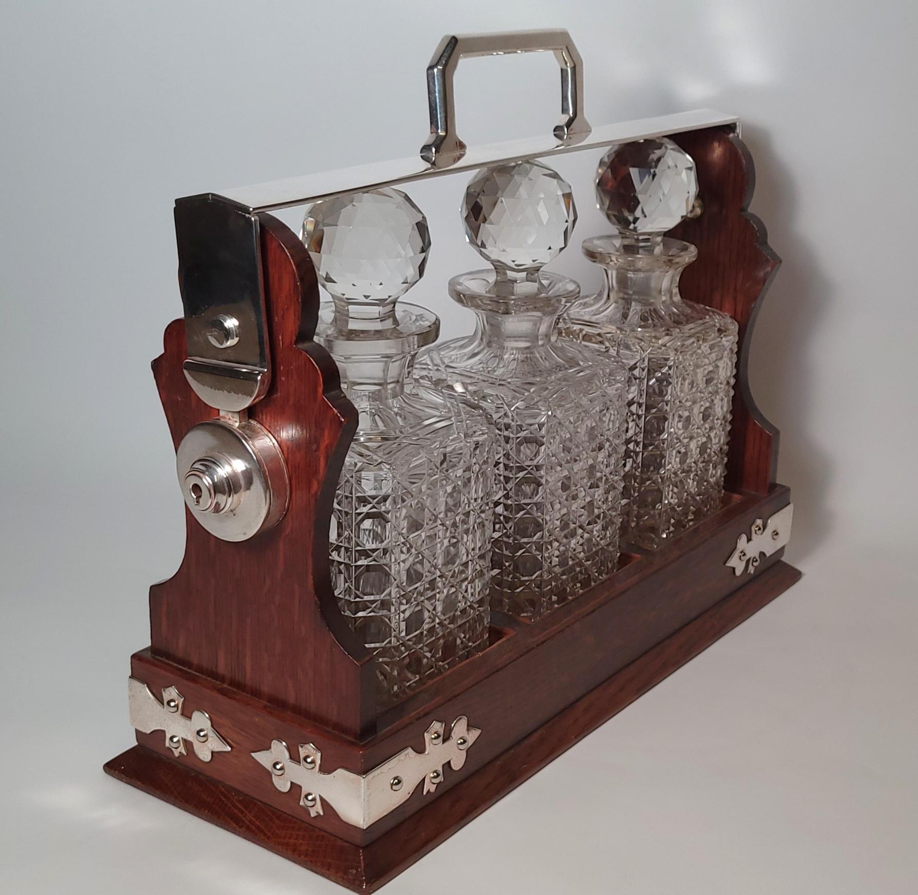 Antique English Oak and Silverplate Tantalus with Cut Crystal Decanters In Good Condition In New Orleans, LA