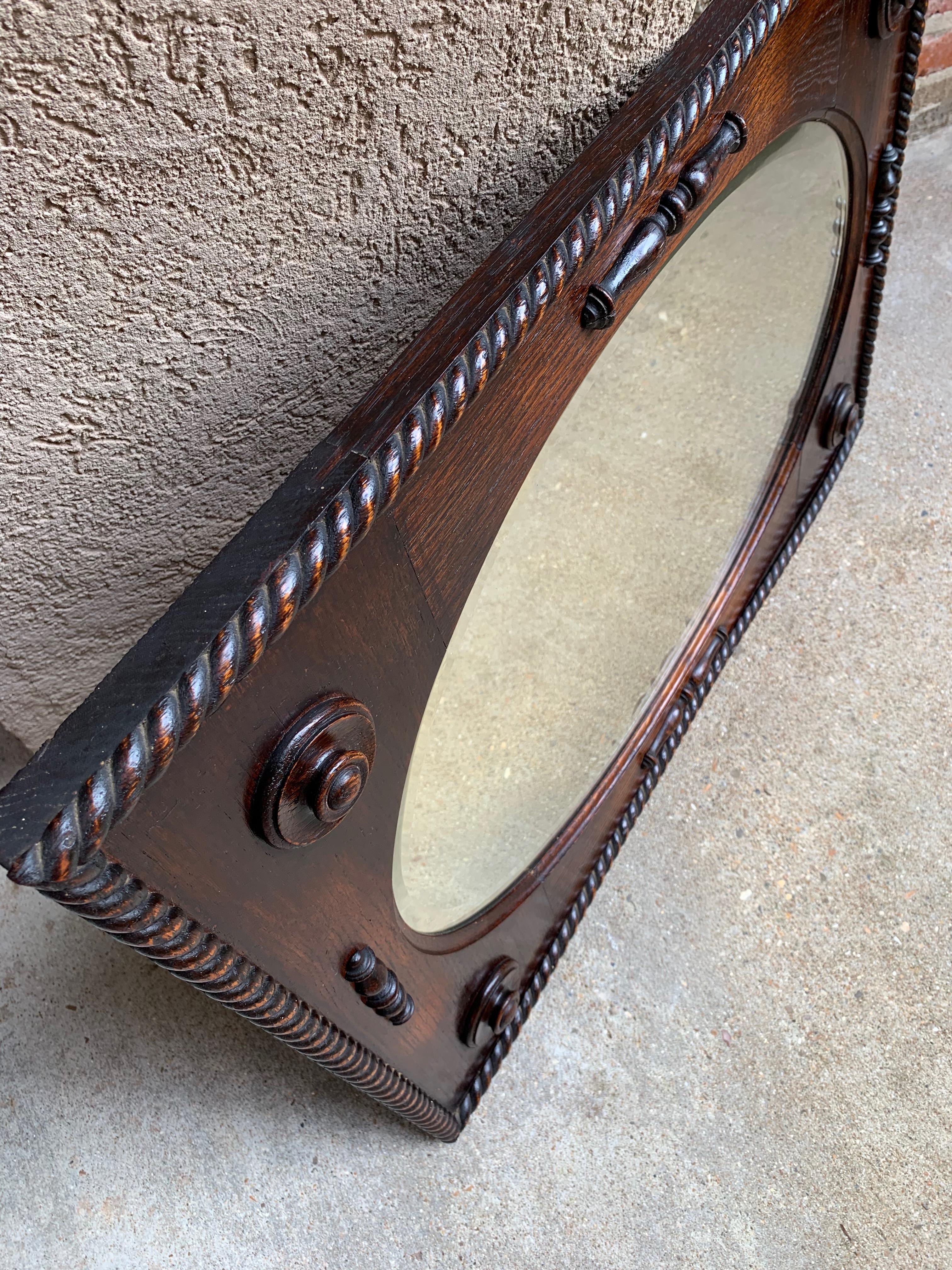 20th Century Antique English Oak Beveled Wall Mirror Barley Twist Frame Oval, circa 1900