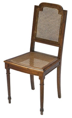 Silla inglesa antigua de caña de roble