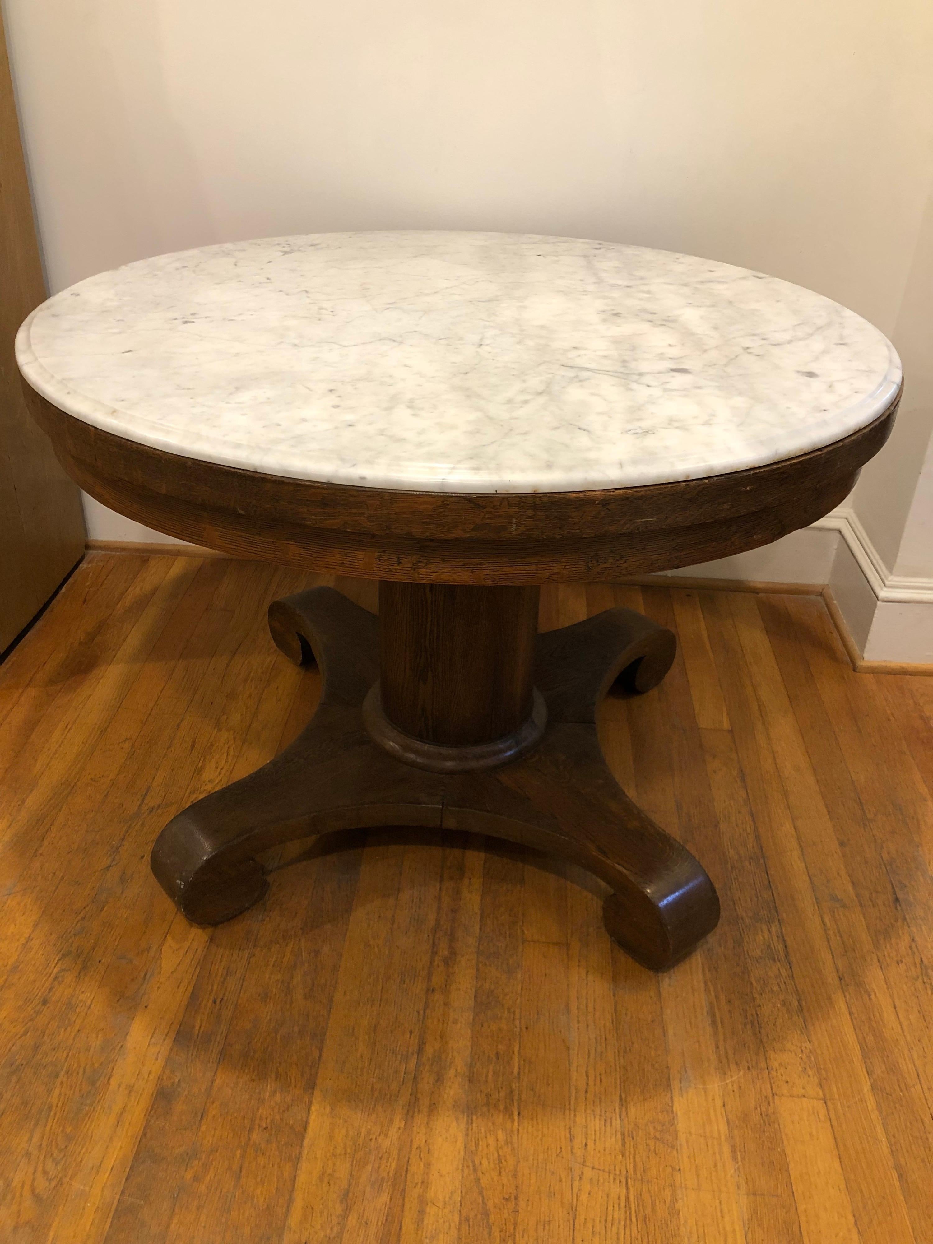 Beautiful quality English oak breakfast table or center table with calcutta marble top.
Classic style and beauty!