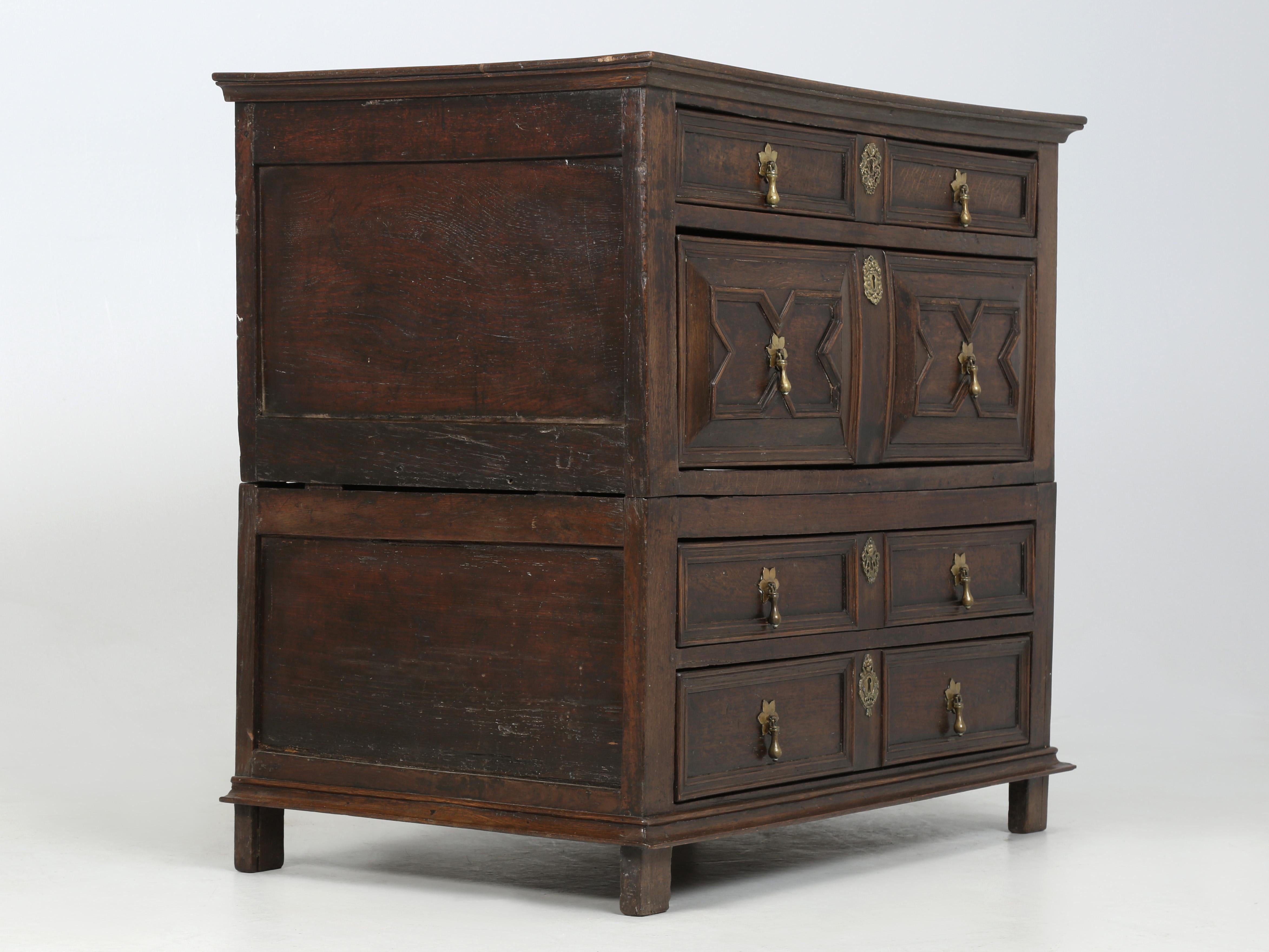 Antique English chest of drawers, as the Brit’s may call it, while we use the term bedroom dresser. Made of English oak and dates probably from the early to mid-1700’s. The dresser splits into 2-halves for easy ingress and egress, which makes moving