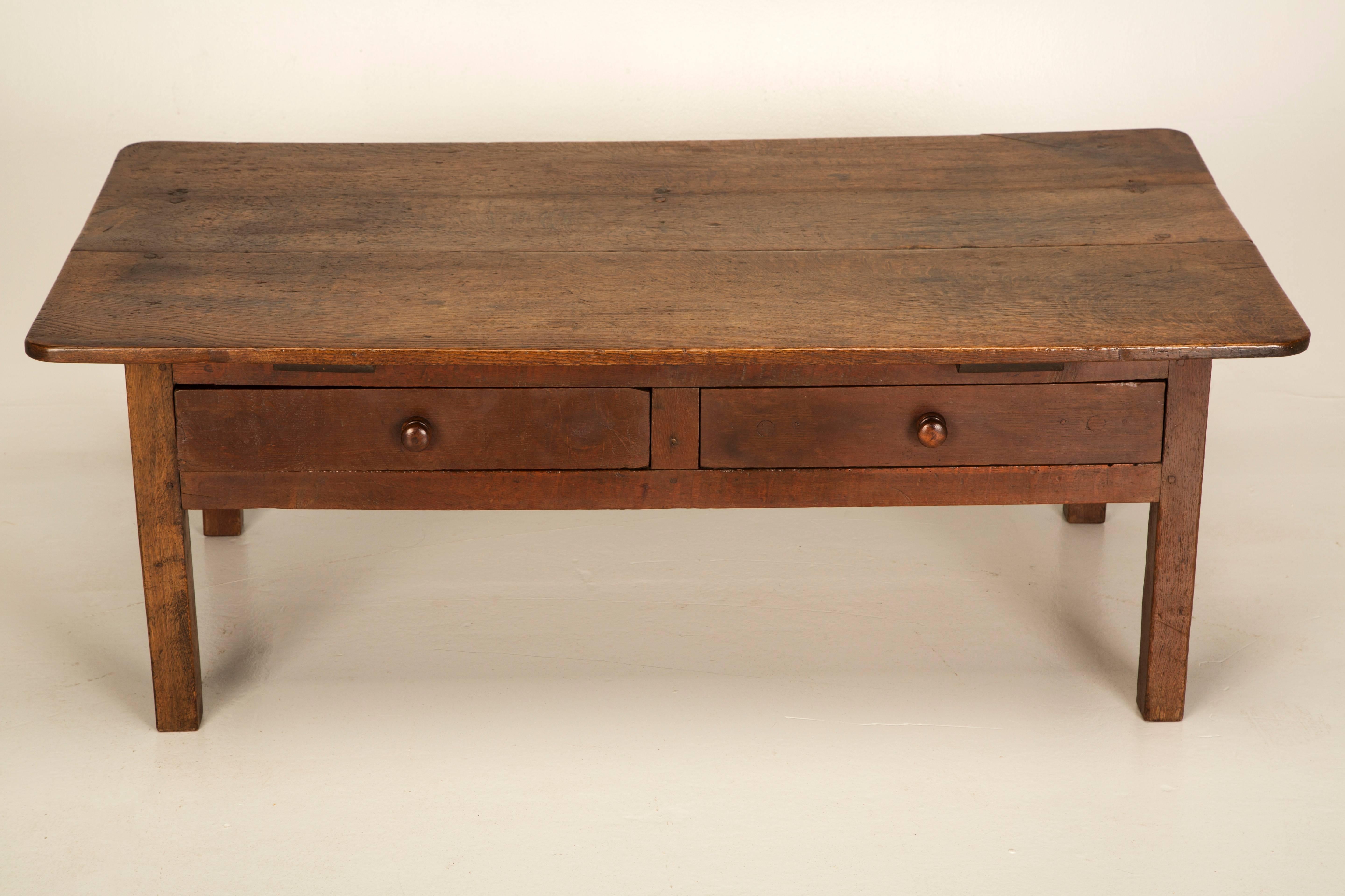 I know that calling this an antique coffee table makes little sense, since there really is no such thing, however, this is an antique English table, that someone a long time ago cut-down to coffee table height. So, you have this 150-year-old oak