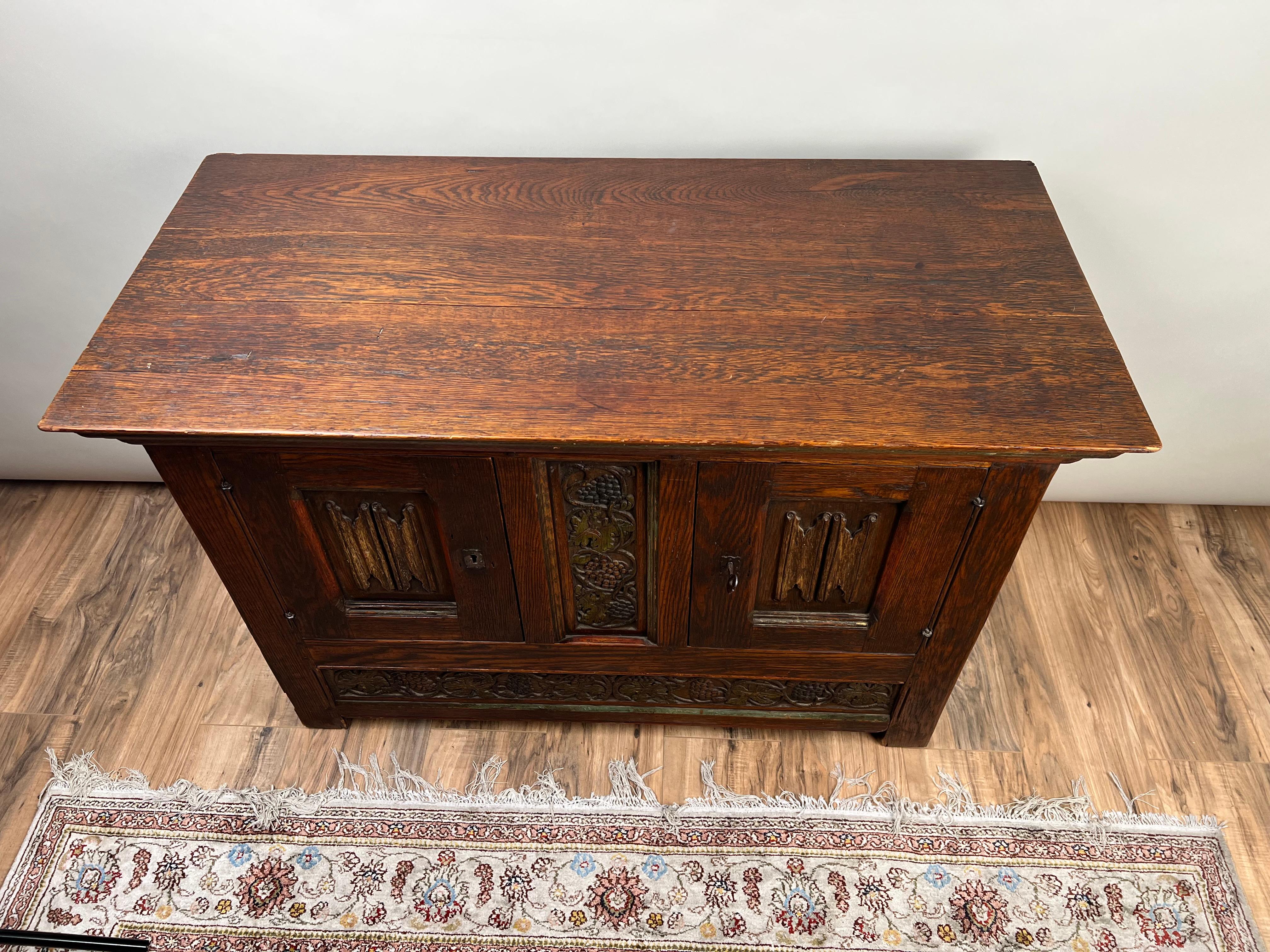 20th Century Antique English Oak Court Cabinet with Linen Fold Carved Panels For Sale