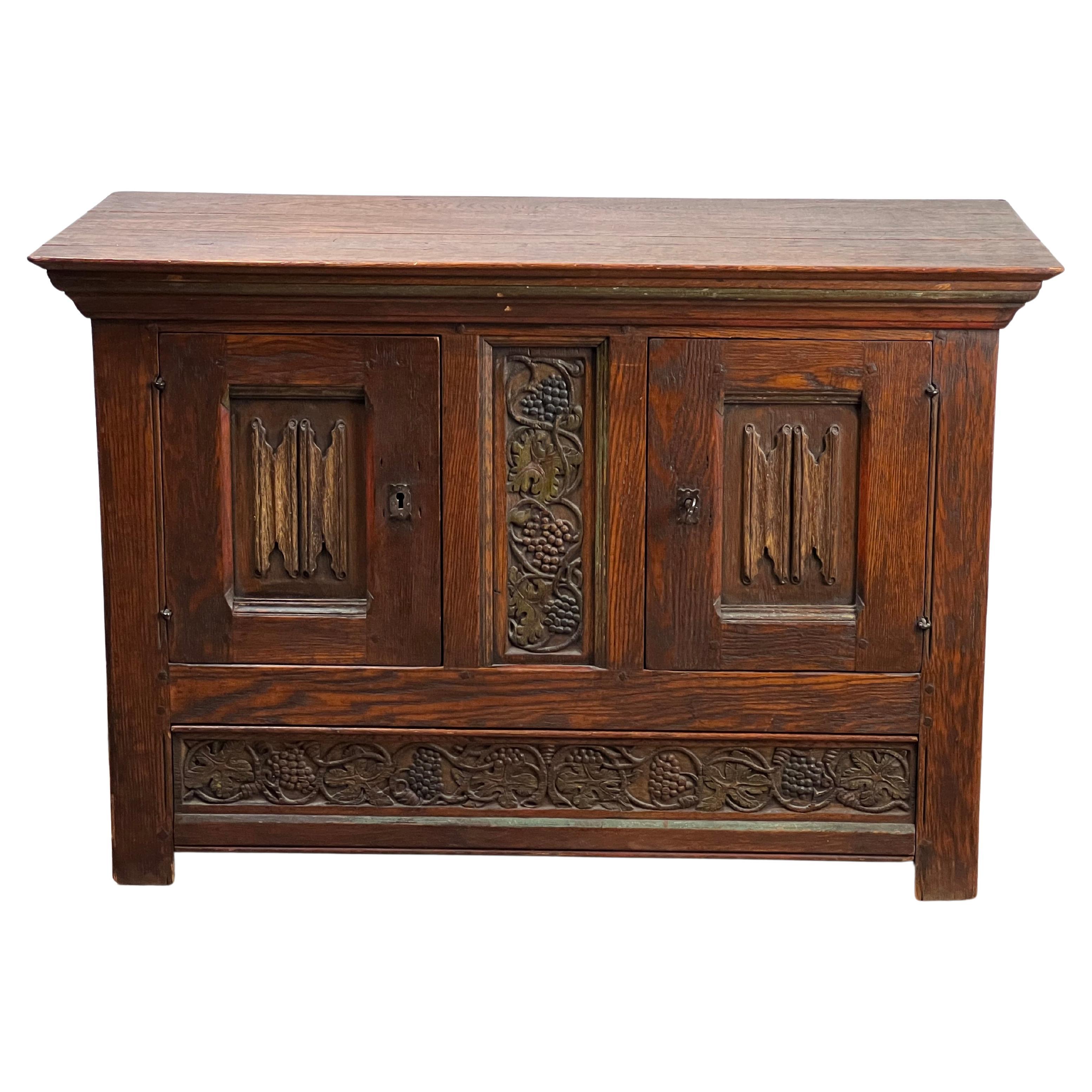 Antique English Oak Court Cabinet with Linen Fold Carved Panels