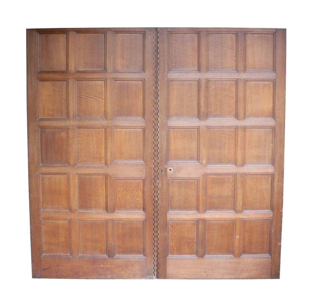 A set of good quality oak double doors, suitable for interior use as room dividing doors.