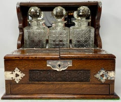 Antique English Oak Games Box 3-Bottle Tantalus with Cordials, circa 1880