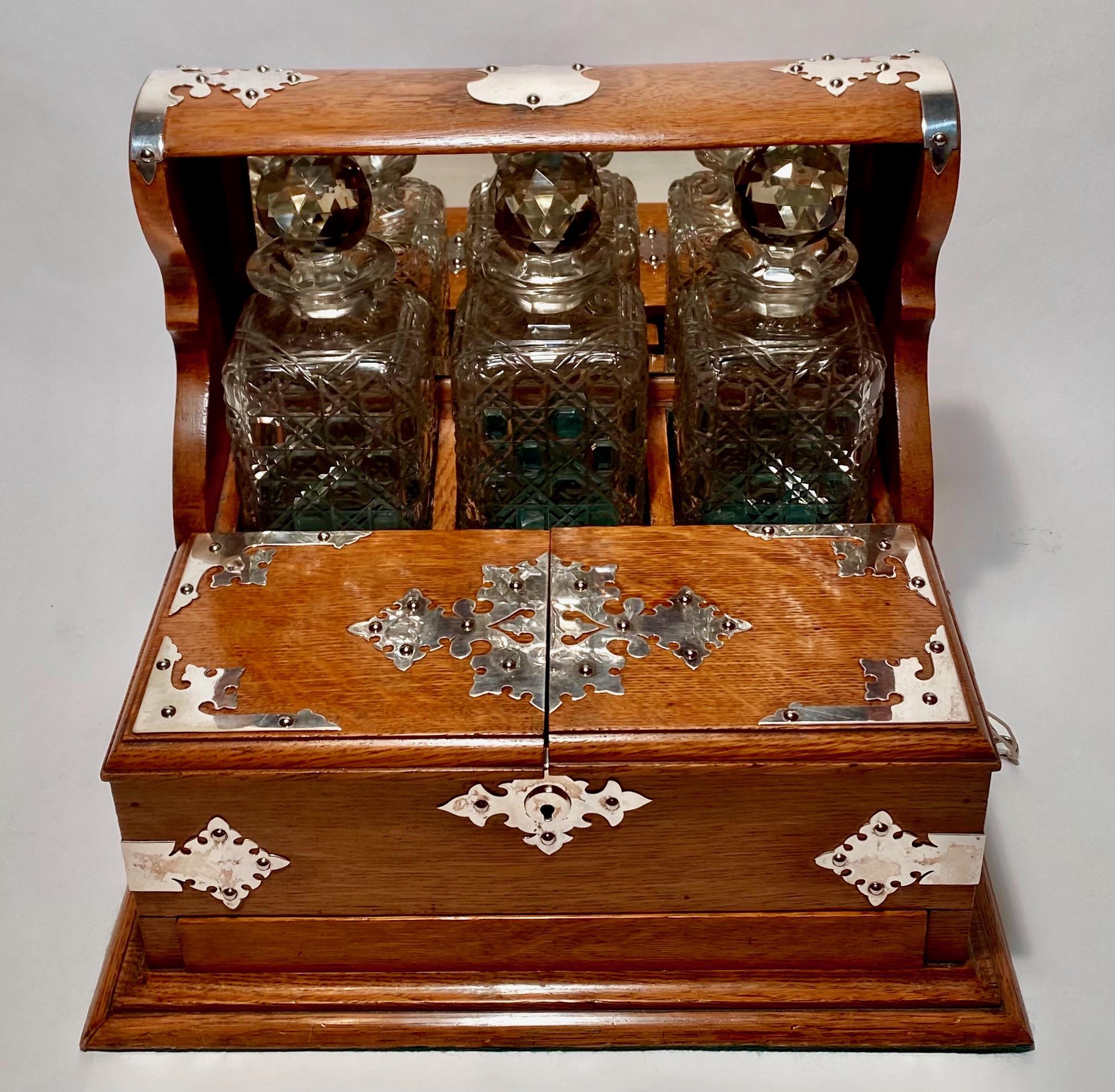 Antique English oak games box Tantalus, circa 1890.
 
  