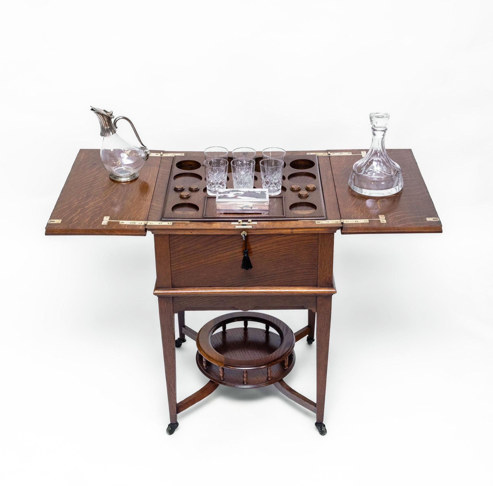Edoardiano Antico mobile da cocktail in Oak Oak Metamorphic Rise & Fall Dry Bar in vendita