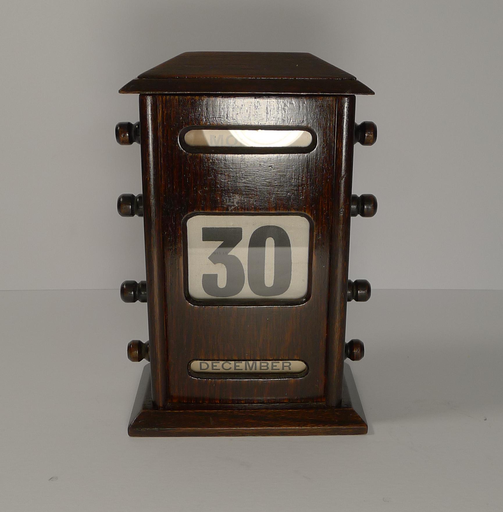 A good sized Edwardian oak perpetual calendar dating to circa 1900.

The keys to the sides are used to forward and rewind the day, date and month behind the glass panel.

Dating to circa 1900, it remains in excellent working condition. Measures: