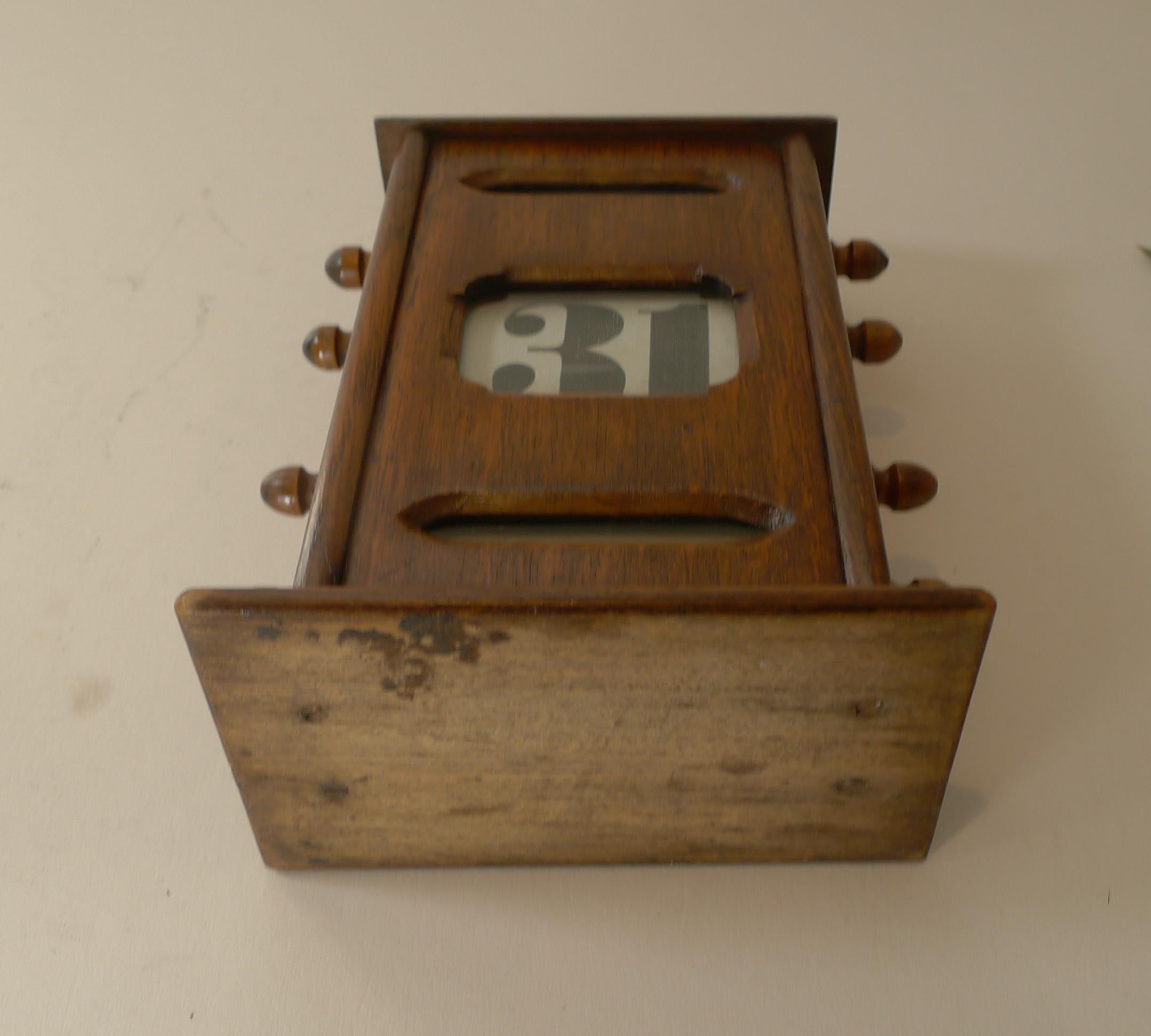 This handsome Edwardian Oak desk-top perpetual calendar is a good size standing 8 1/4