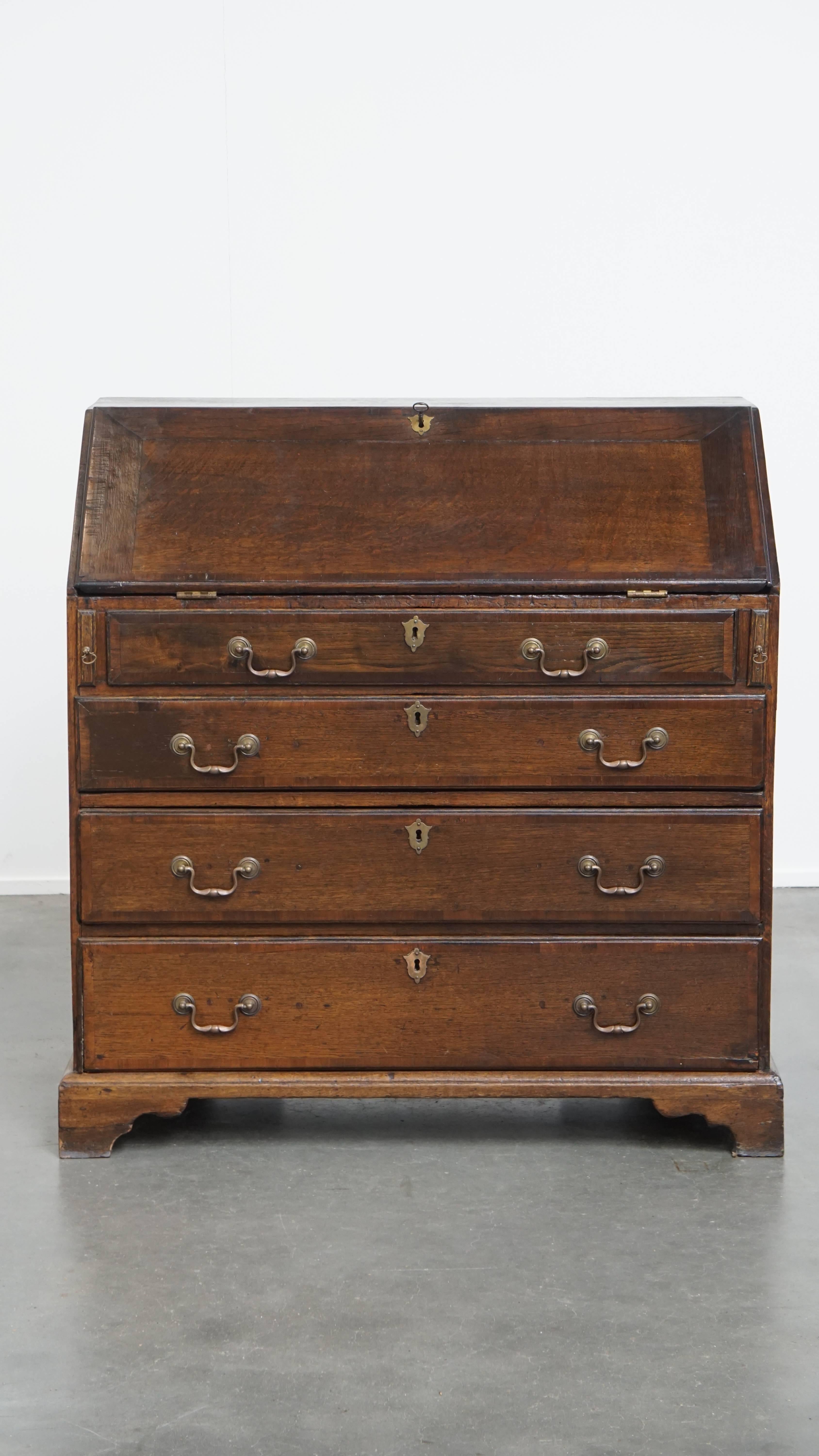 Offered is this timeless and charming antique English oak secretary / chest of drawers with a beautiful interior. 

With this versatile piece, you bring timeless charm into your home that fits seamlessly into both classic and modern interiors.

The