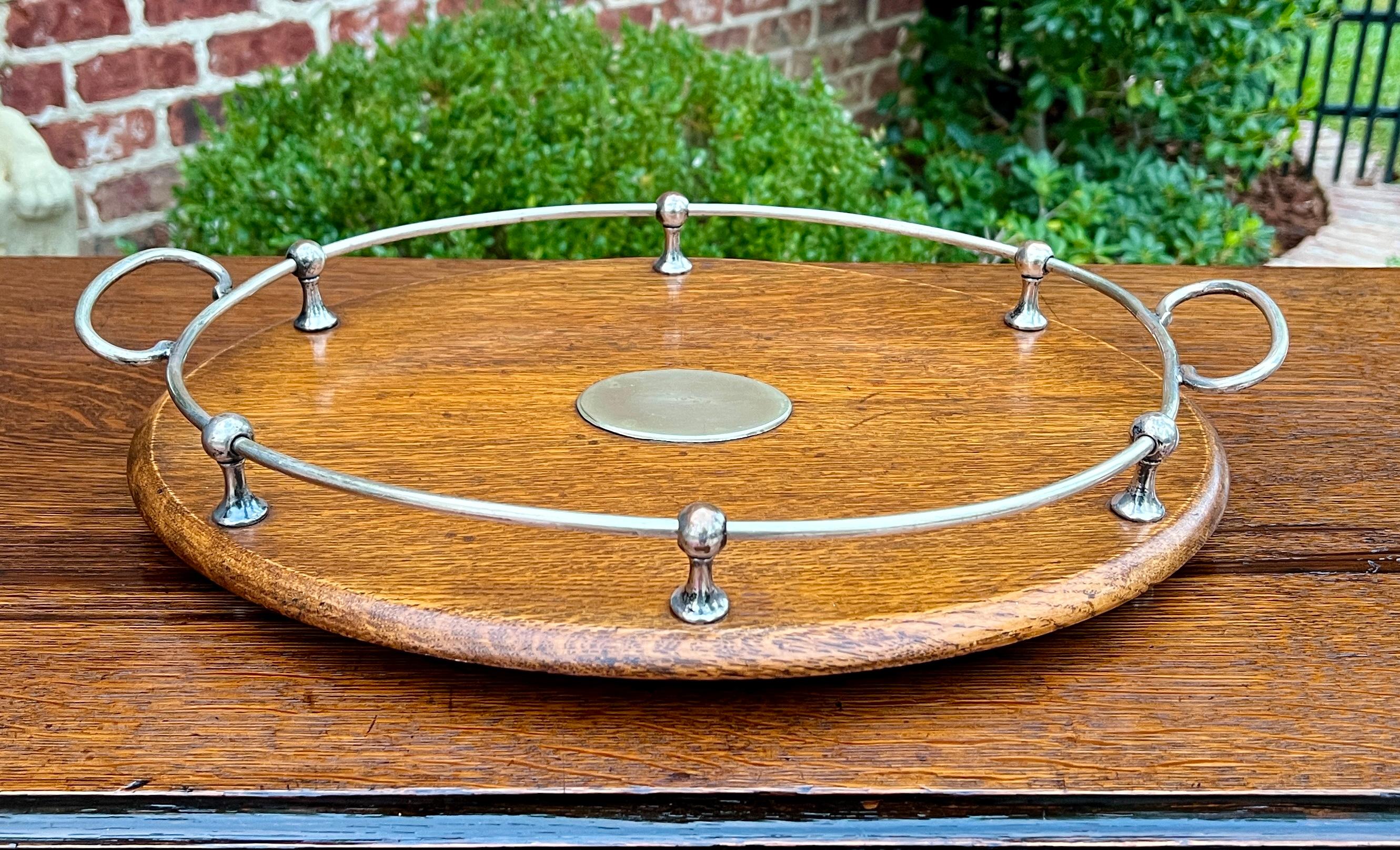 EXCELLENT Antique English OAK  Serving Tray or Platter

Beautiful decorative oak serving tea tray or platter with silver plate gallery and center medallion~~blank medallion for easy personalization! 


        17.5