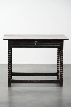 Antique English oak side table from the 18th century with bobbin legs
