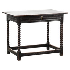 Antique English oak side table from the 18th century with bobbin legs