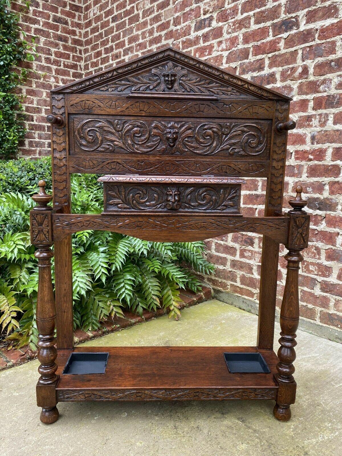 Antique english oak Gothic Revival foyer entry hall tree umbrella stand, cane or stick stand and drip pans c. 1880s-1890s

Outstanding antique English umbrella Stand~~perfect for a entry hall or mudroom for umbrellas or canes~~use it as a