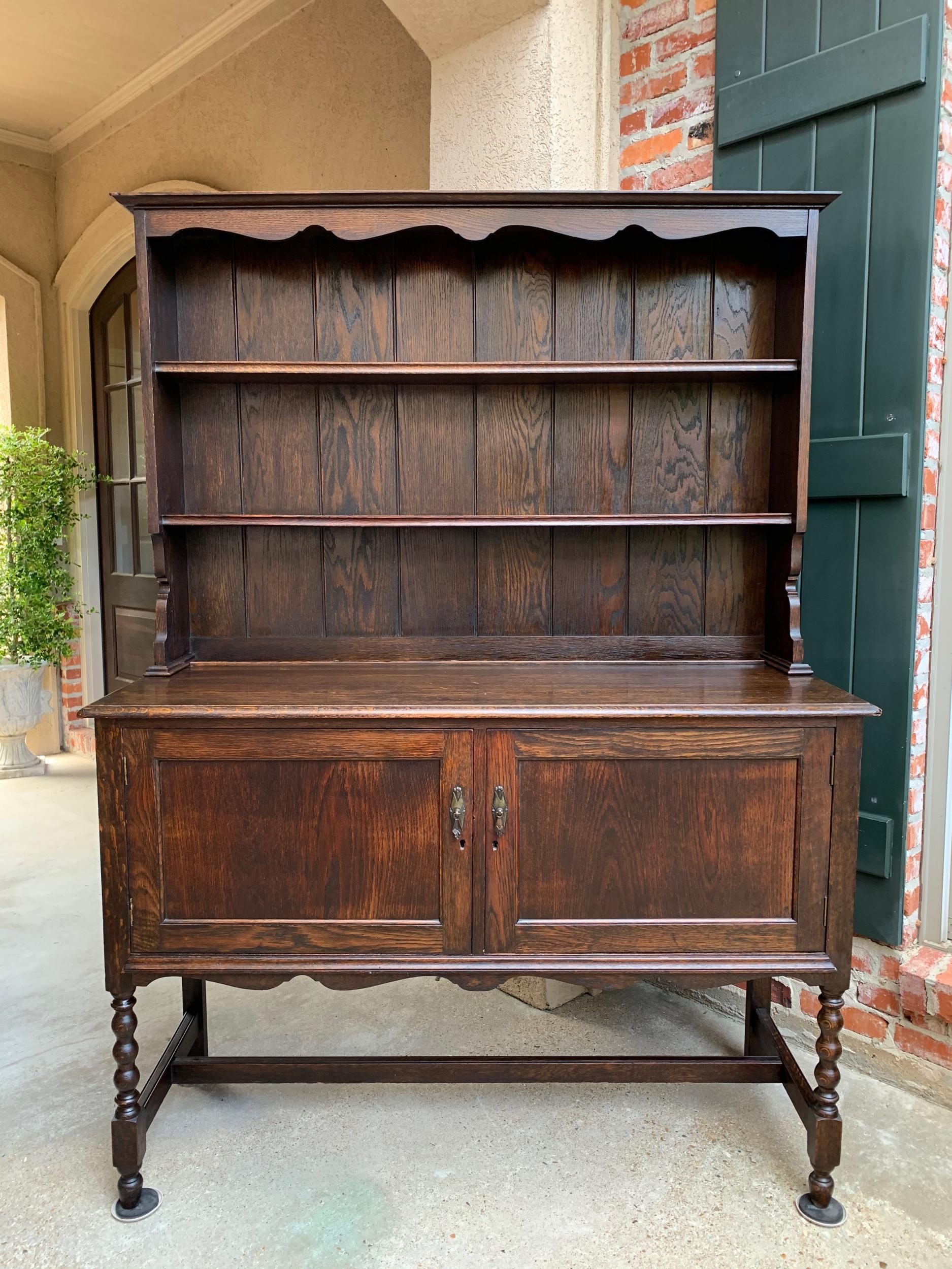 Antique English oak welsh dresser sideboard buffet Jacobean Hutch, 20th century
 
~Direct from England~
Always a classic, this proper antique English “welsh dresser” or sideboard blends perfectly with every style, and provides an abundance of