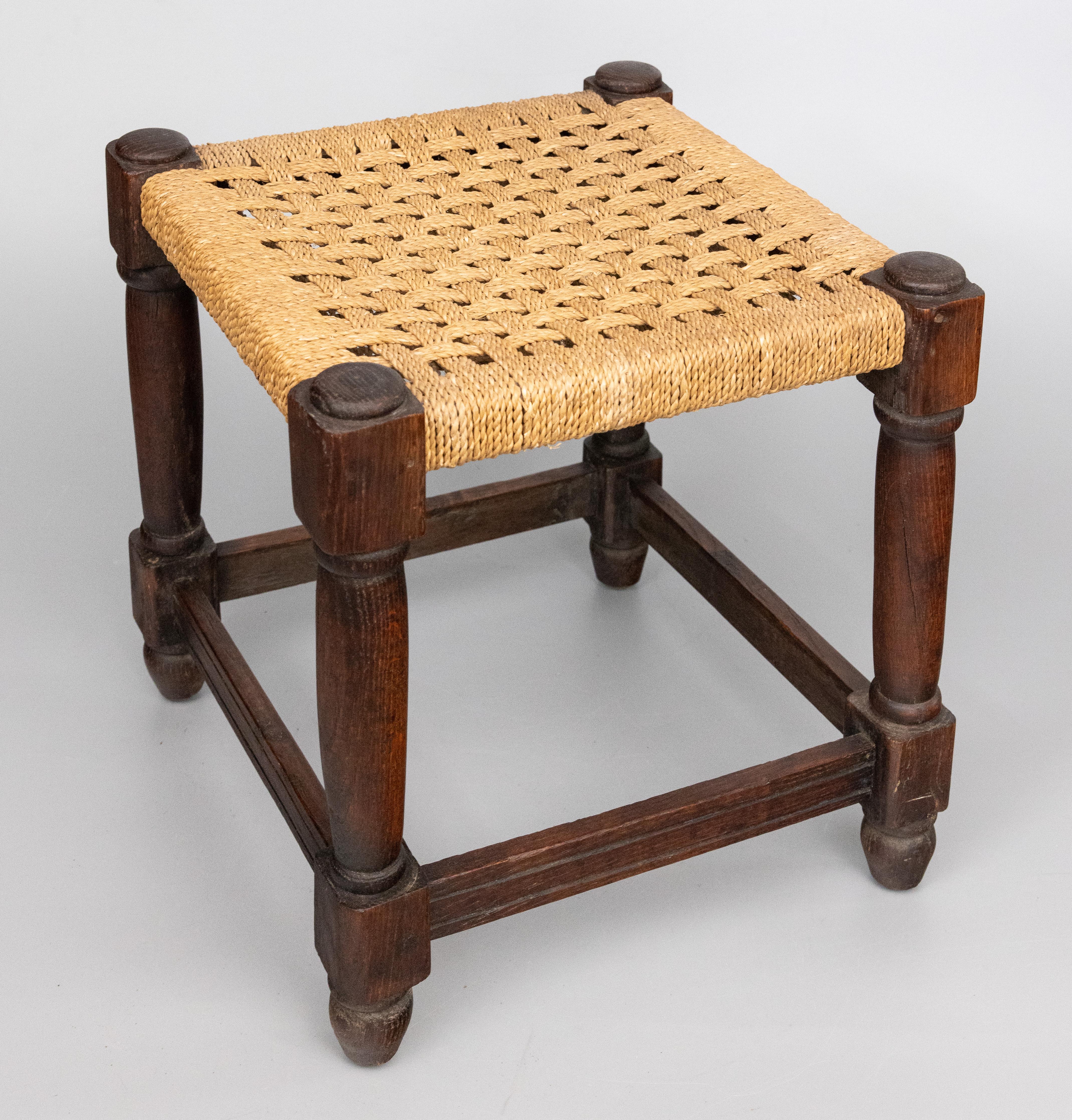 A superb English oak stool / footstool with hand turned legs and stretchers and hand woven corded string seat, circa 1900. This charming stool would make a wonderful foot rest or a small drinks table with a tray on top.

DIMENSIONS
14.75ʺW × 14.75ʺD