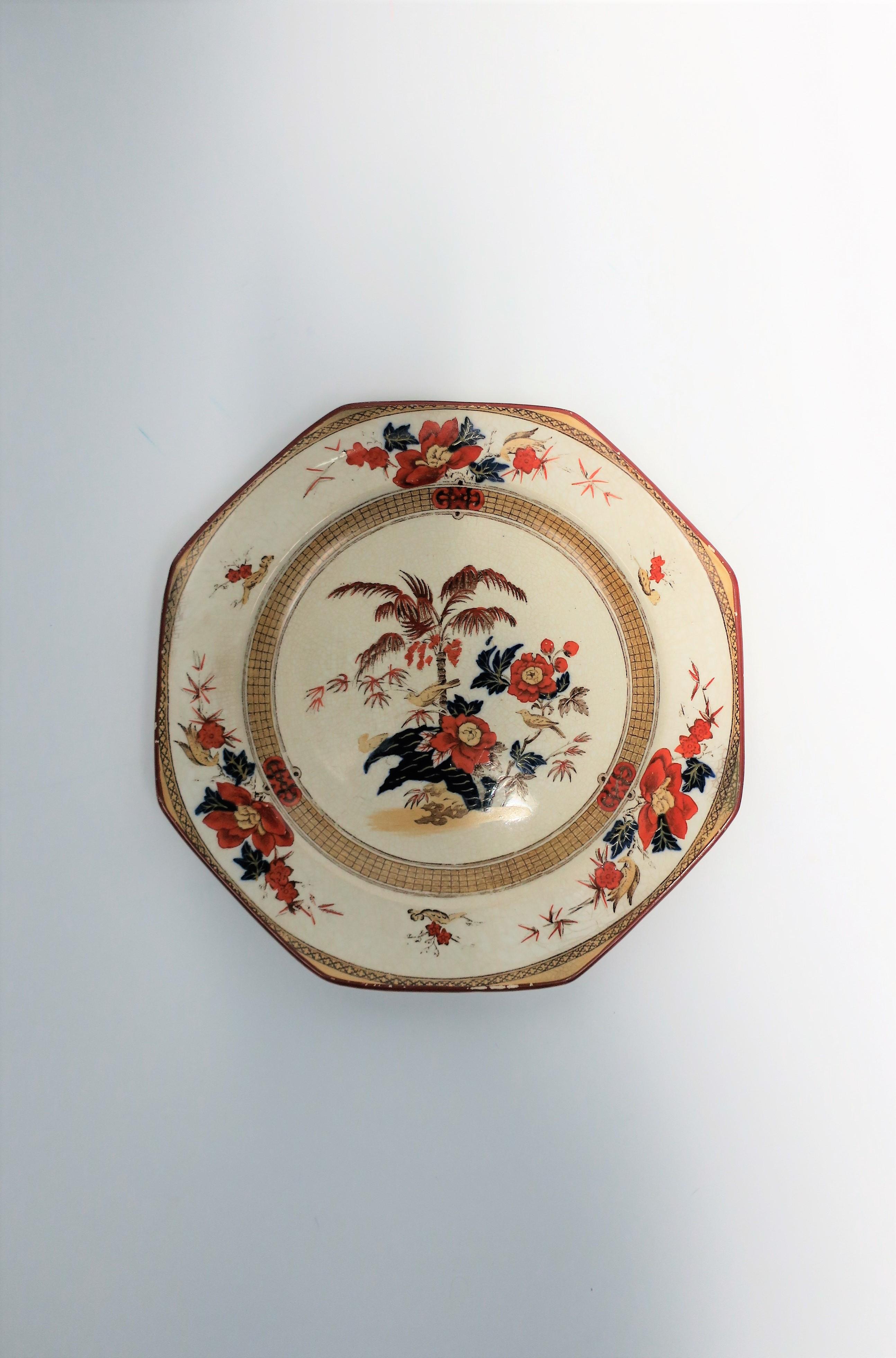 A beautiful English octagonal decorated pate by Wedgwood, early -20th century, England. Plate has a modern octagonal shape, decorated with birds, flowers, and a beautiful palm tree at center. Marker's mark and numbered on back, please see images #7