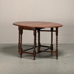 Table ovale à pieds repliables d'époque anglaise, en chêne massif avec pieds tournés, XIXe siècle